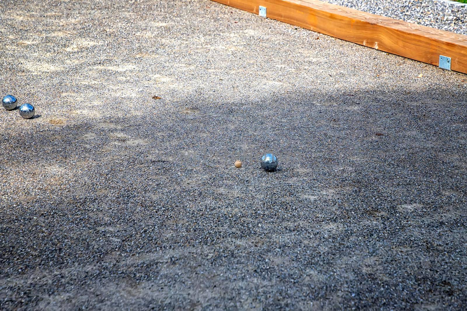 Petanque balls in the playing field, Ball of petanque is iron for a throw at relaxing time by EdVal