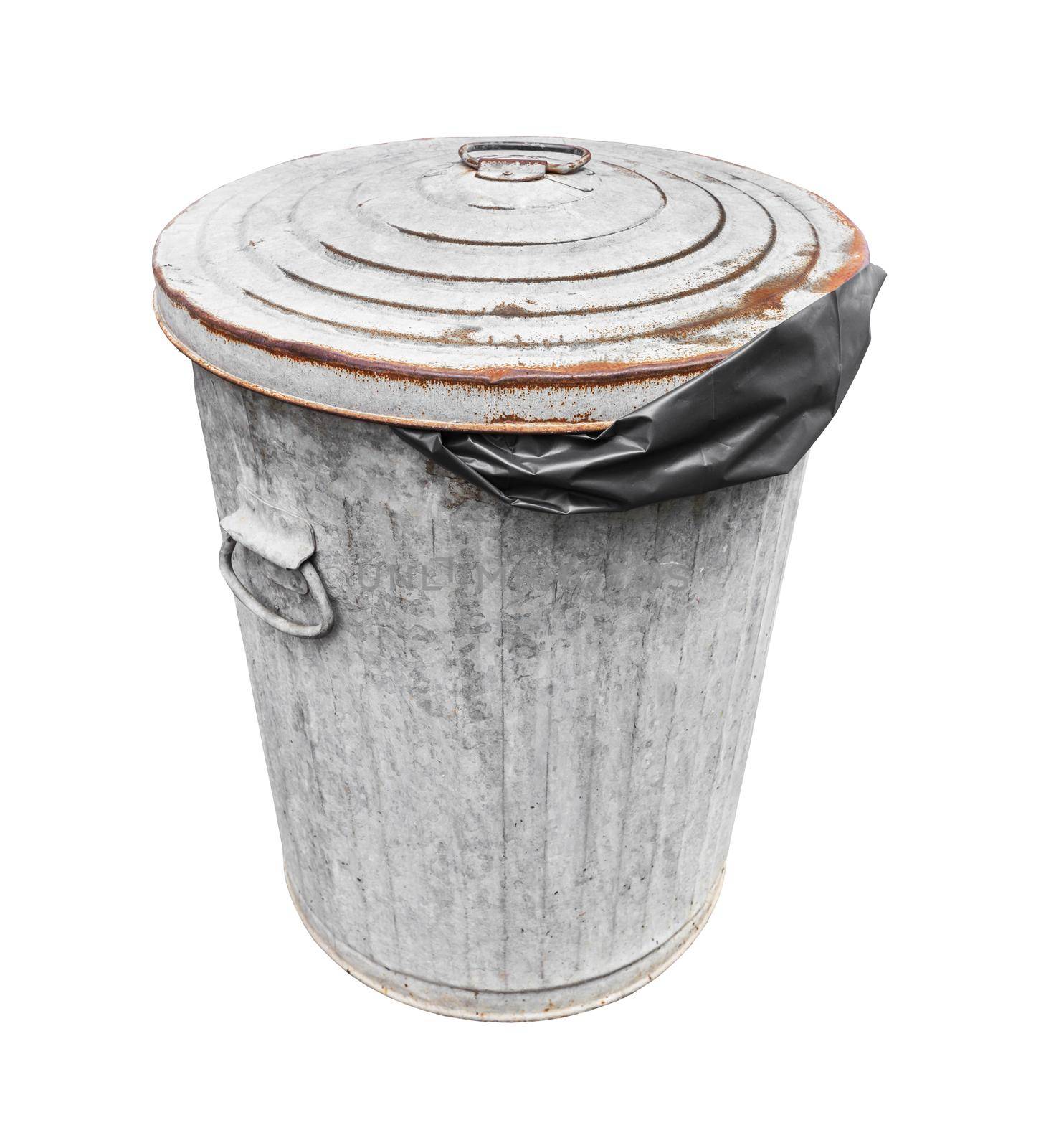 Rusty old trash with black plastic bag can isolated on white with a clipping path. by Gamjai