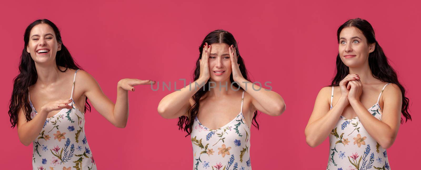 Close-up shot of a gorgeous brunette girl in a white dress with floral print showing different faces while posing against a pink studio background. Set of a people sincere emotions. Copy space.