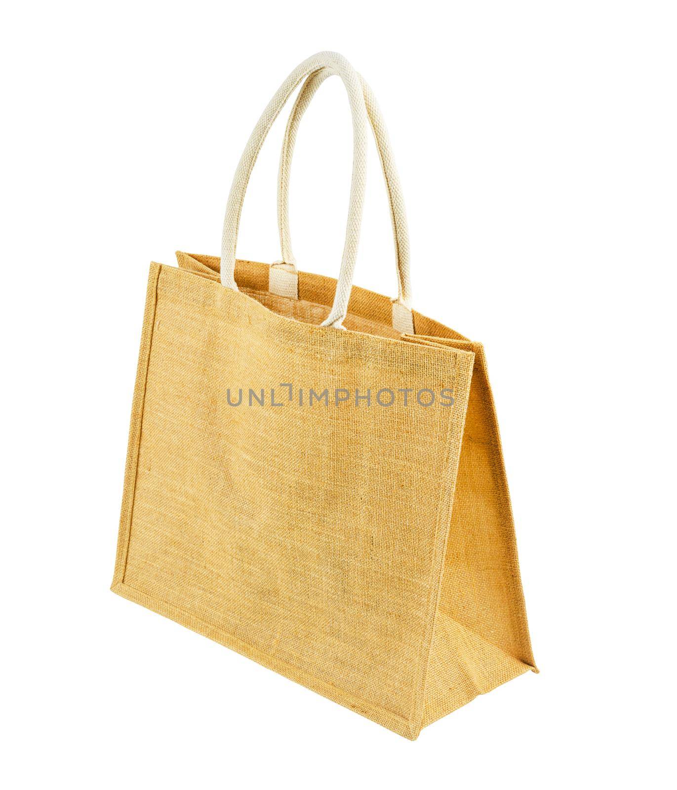 Hessian or jute bag - reusable brown shopping bag with loop handles isolated on white background. by Gamjai