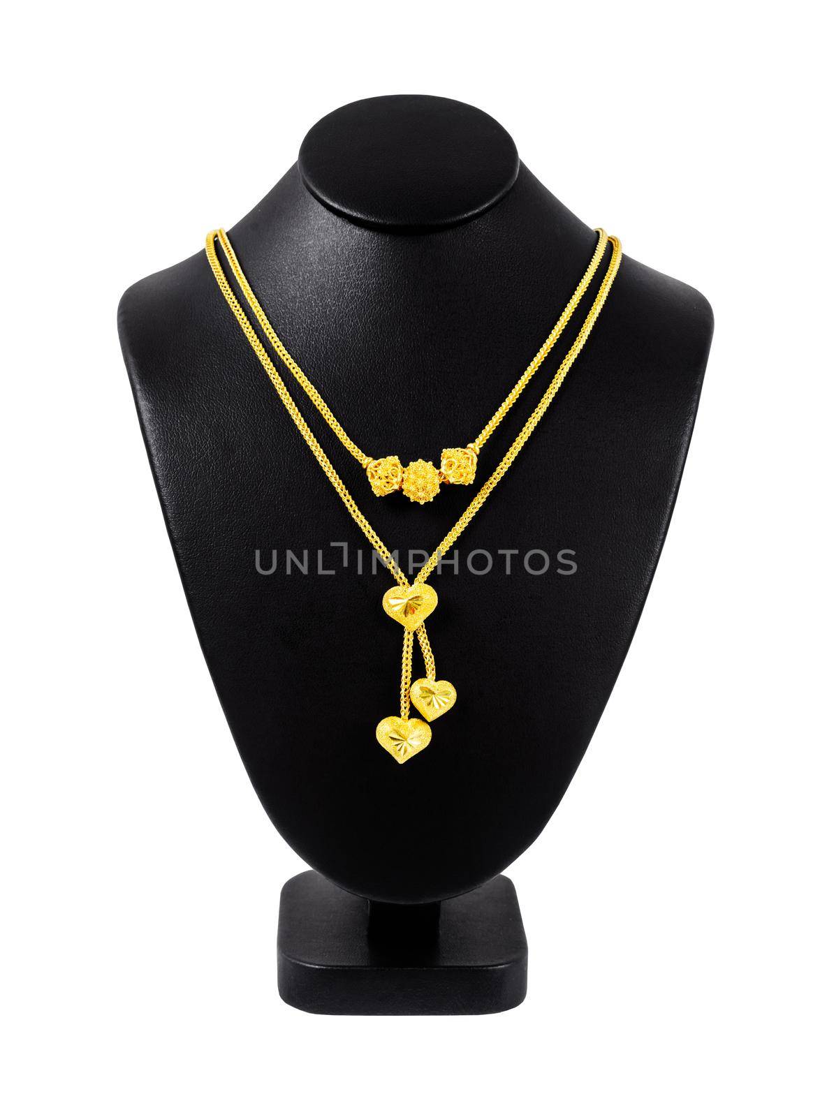 Gold necklace on necklace display stand isolated on white background, Save Clipping path. by Gamjai