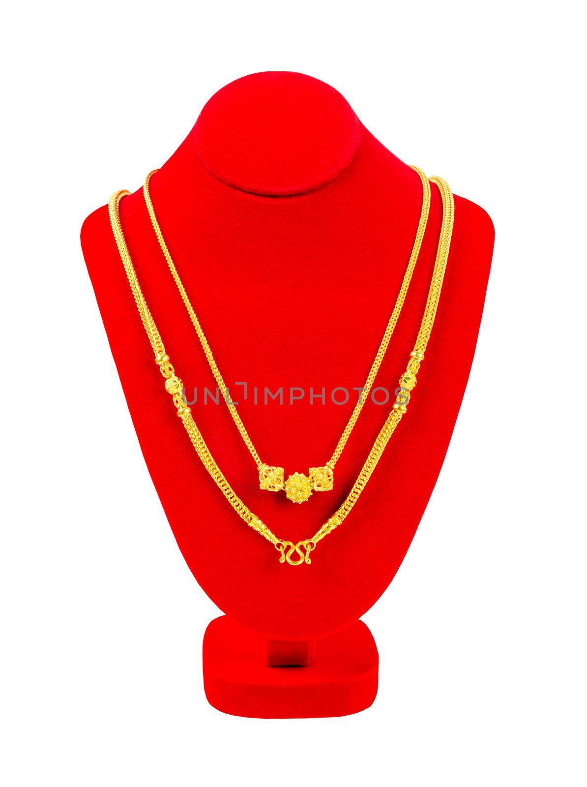 The Gold necklace on necklace display stand isolated on white background, Save Clipping path.