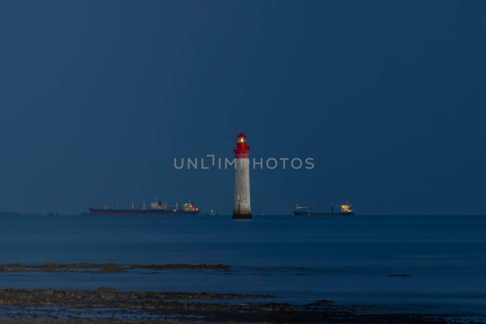 Phare de Chauvea near Ile de Re with ships to La Rochelle, Pays de la Loire, France by phbcz