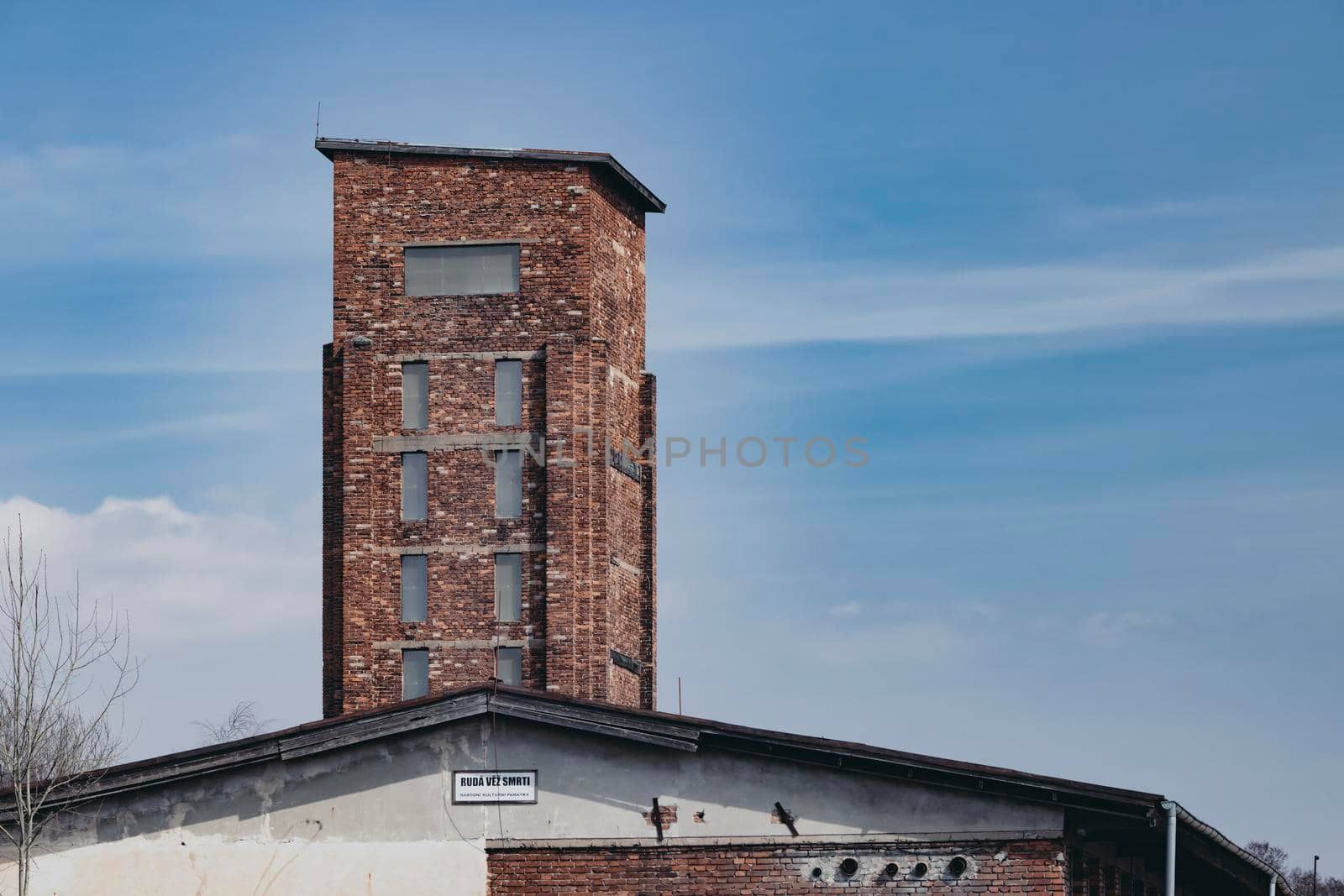 Red Tower of Death, UNESCO site with inscription in Czech language "Ruda vez smrti" a national monument in Dolni Zdar near Ostrov, Western Bohemia, Czech Republic