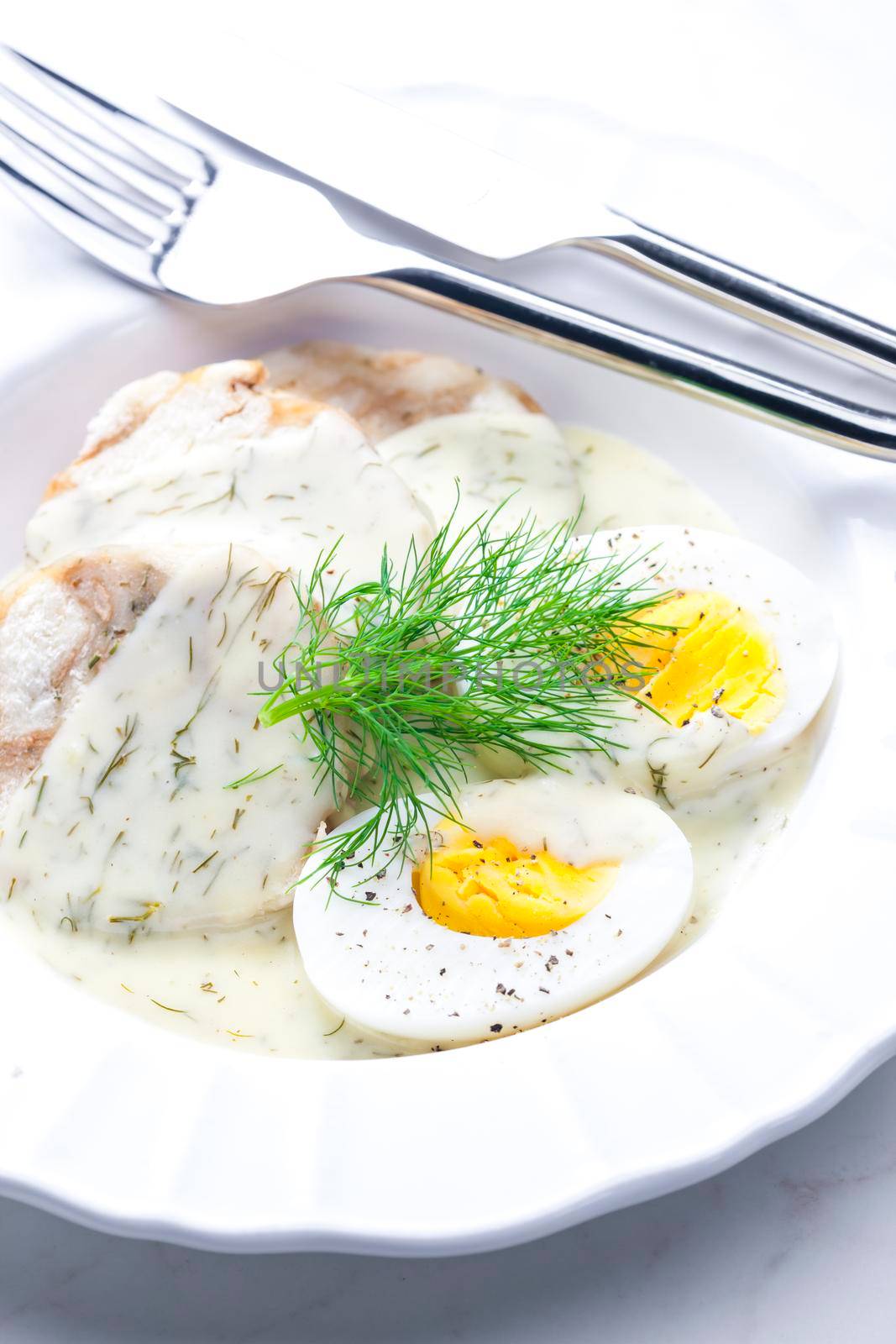 dill sauce with dumplings and boiled eggs