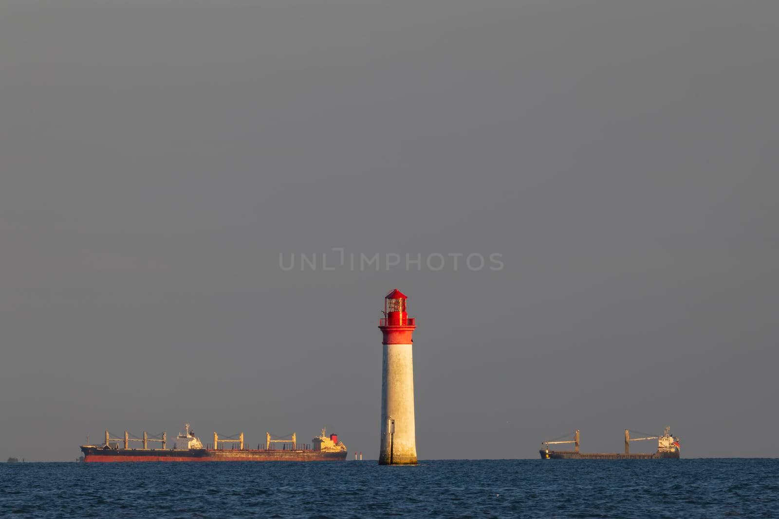 Phare de Chauvea near Ile de Re with ships to La Rochelle, Pays de la Loire, France by phbcz