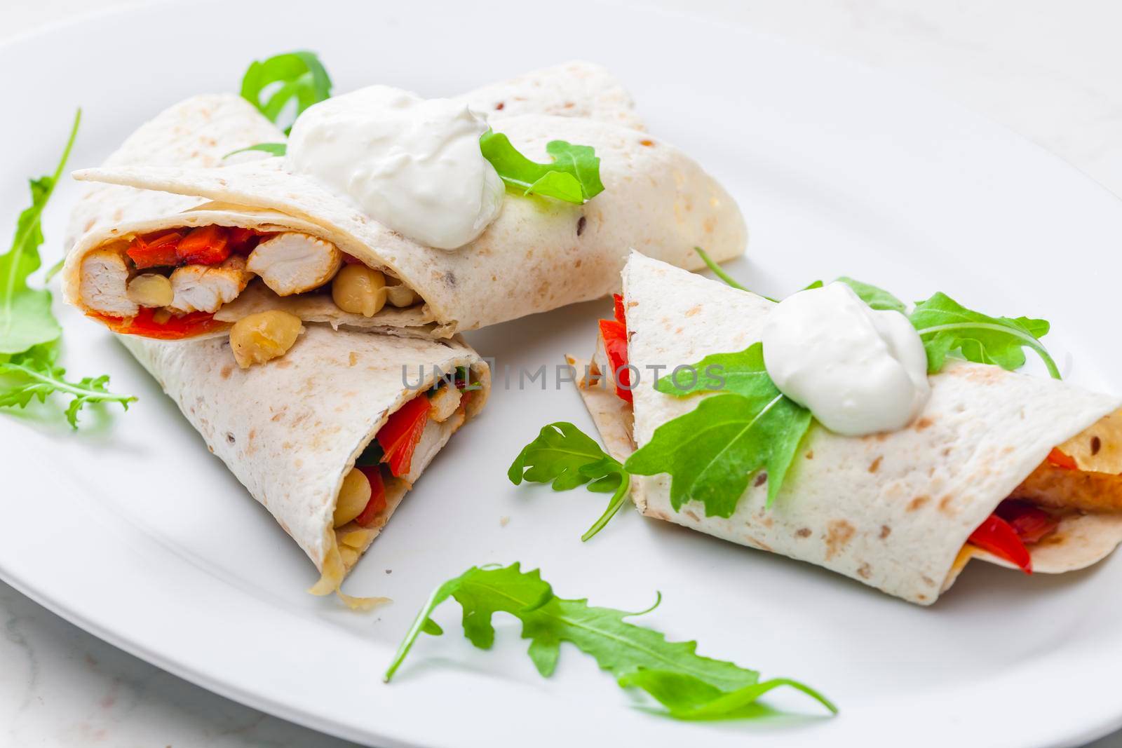 tortilla filled with chicken meat, red pepper and beans by phbcz