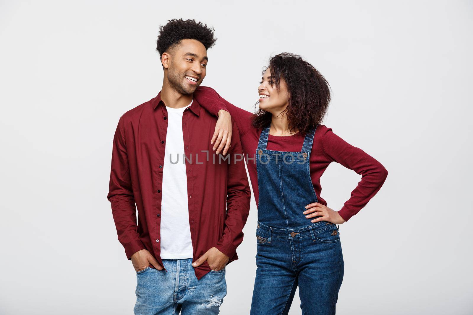 Beautiful portrait of a happy African American couple isolated over white.