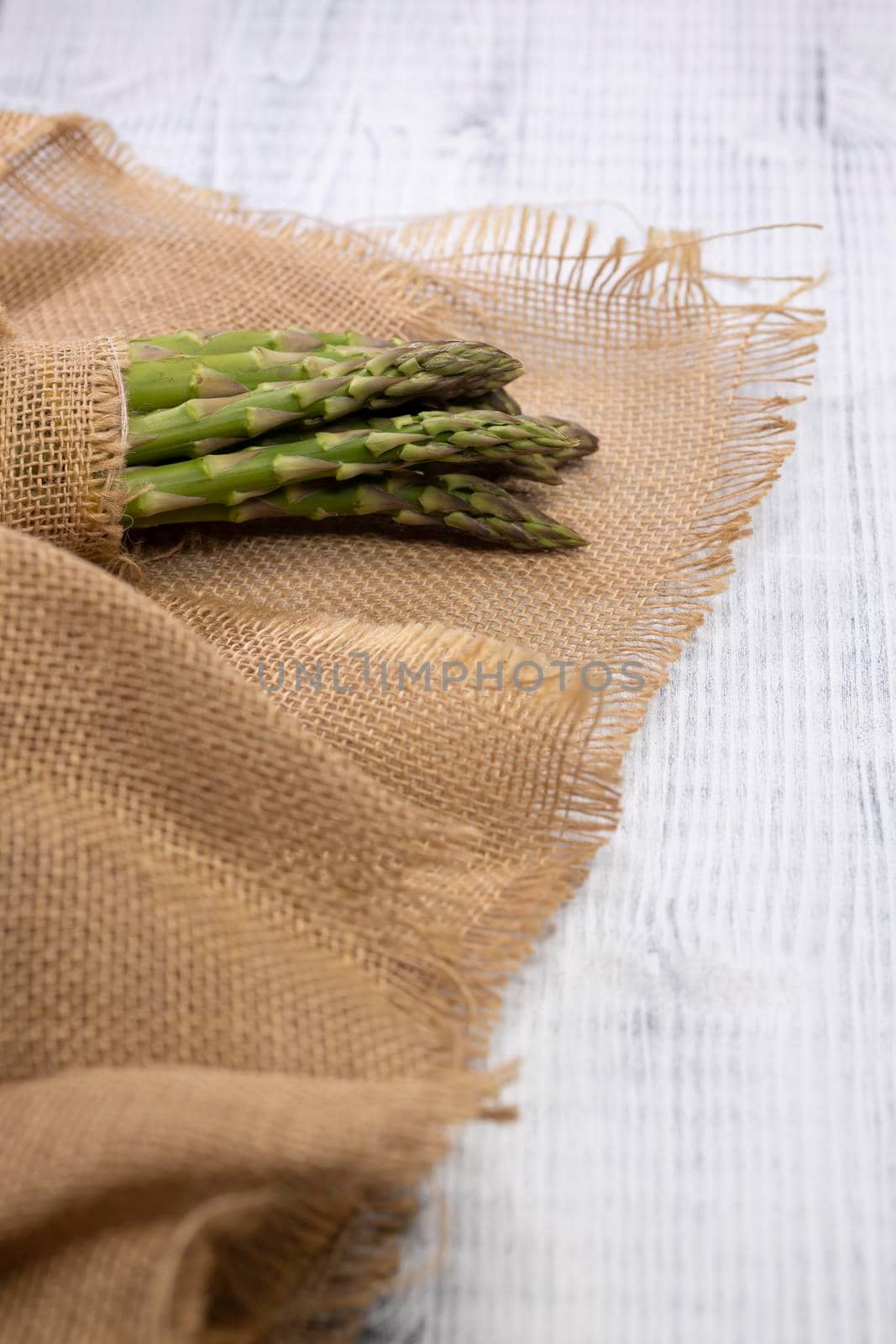 still life with fresh green asparagus by phbcz