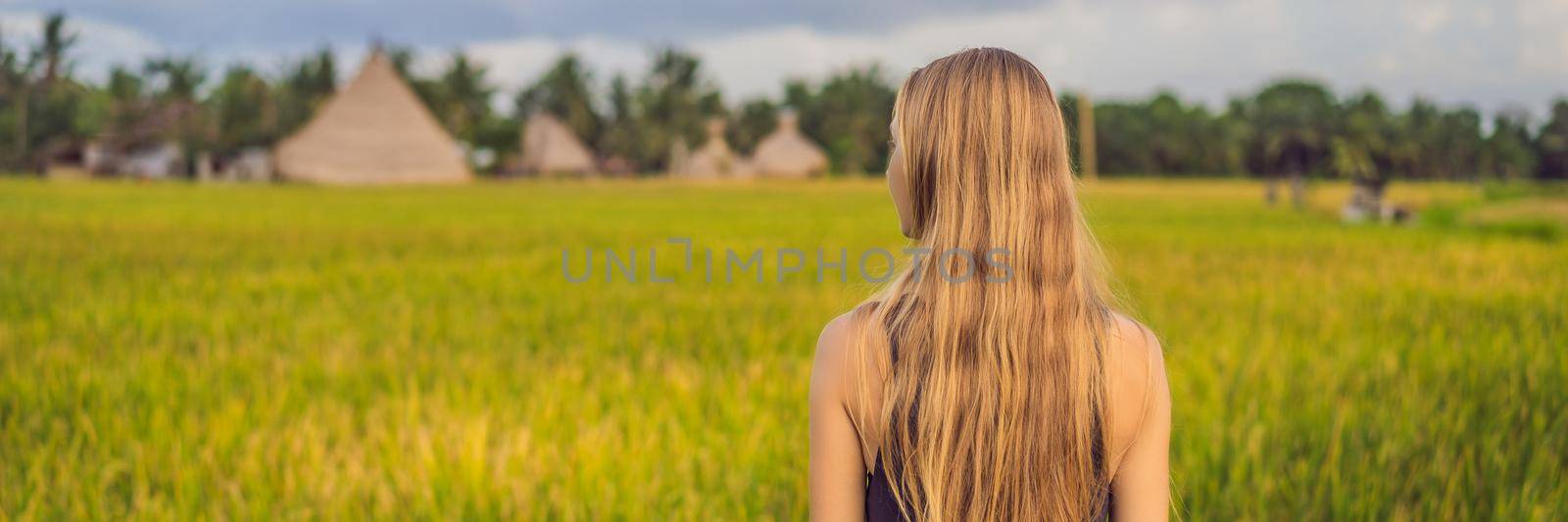 Women tourists enjoy the panoramic view of the beautiful Asian scenery of rice fields. BANNER, LONG FORMAT