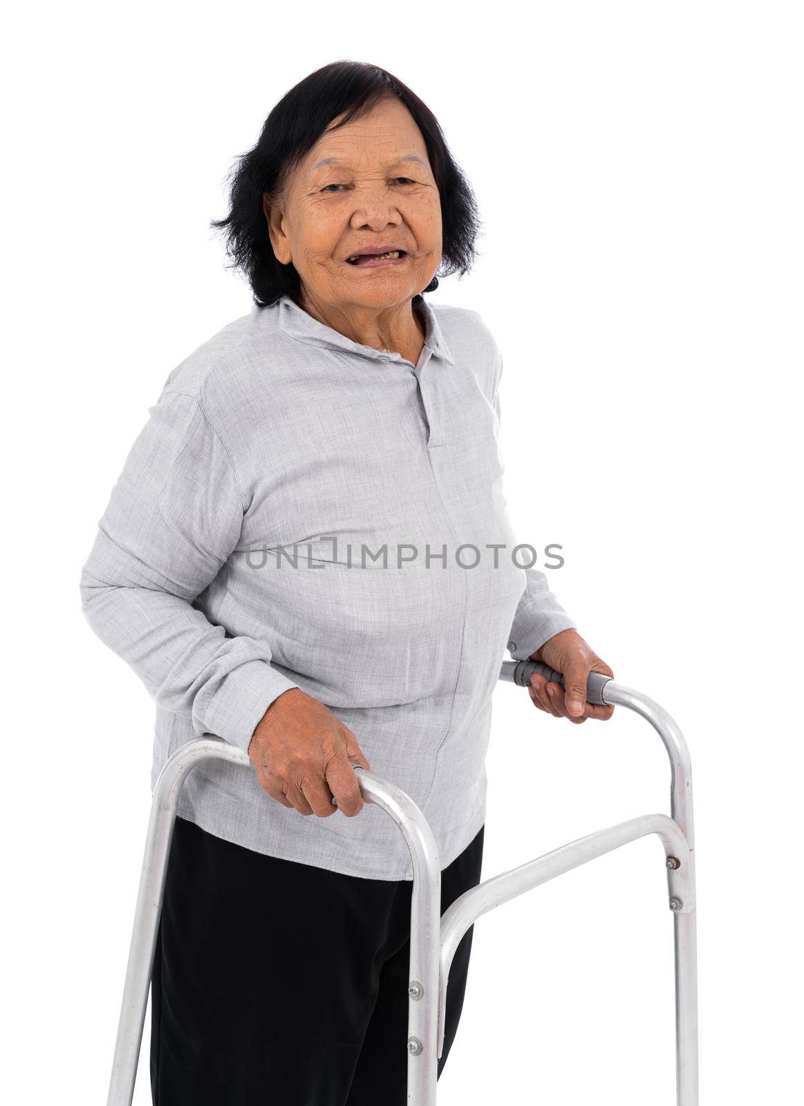 senior woman using walker isolated on a white background