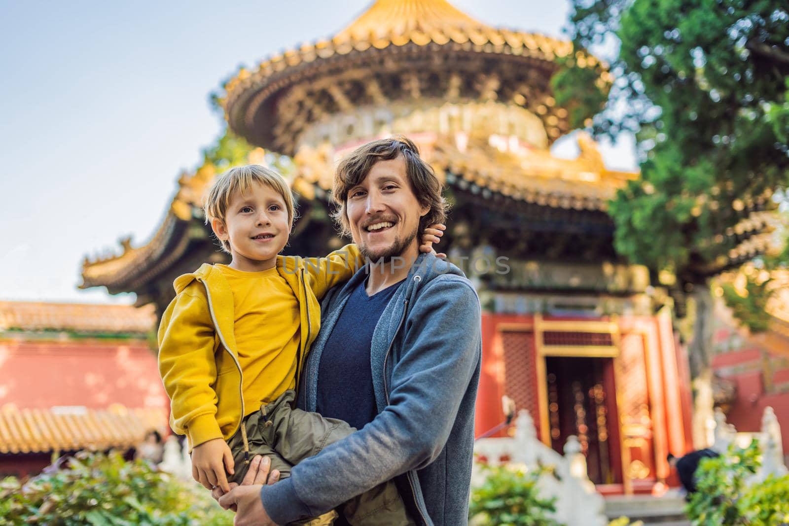 Enjoying vacation in China. Dad and son in Forbidden City. Travel to China with kids concept. Visa free transit 72 hours, 144 hours in China by galitskaya
