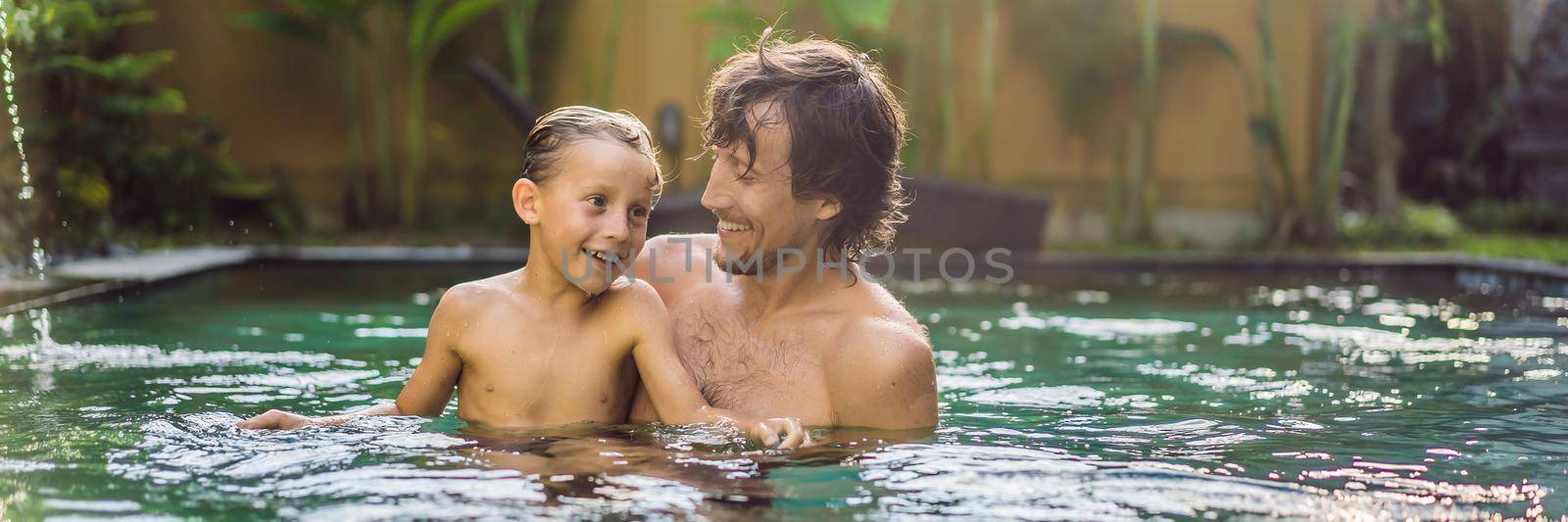 Dad and son have fun in the pool BANNER, LONG FORMAT by galitskaya