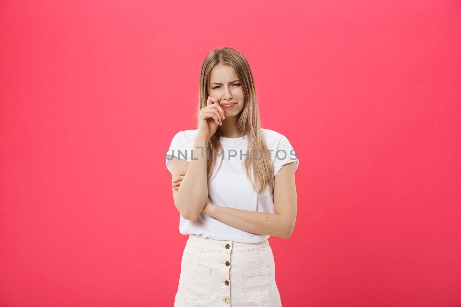 Young caucasian woman over isolated background depressed and worry for distress, crying angry and afraid. Sad expression by Benzoix