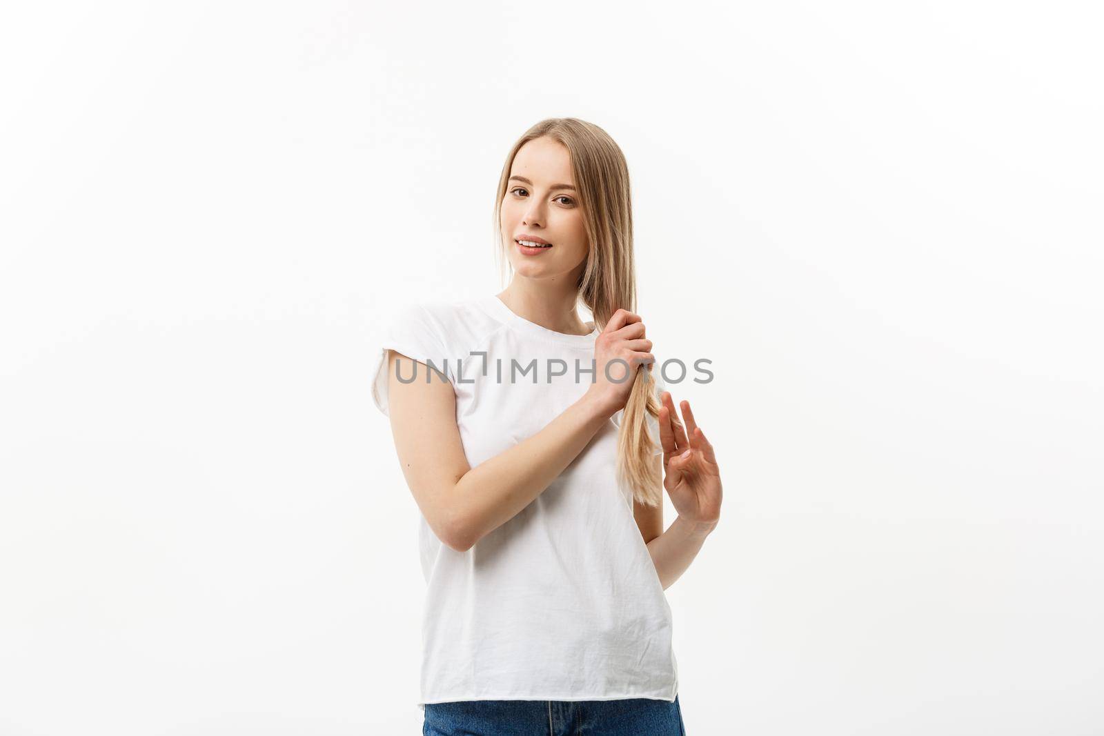 Caucasian young confident woman. Model white t-shirt isolated on white background. by Benzoix