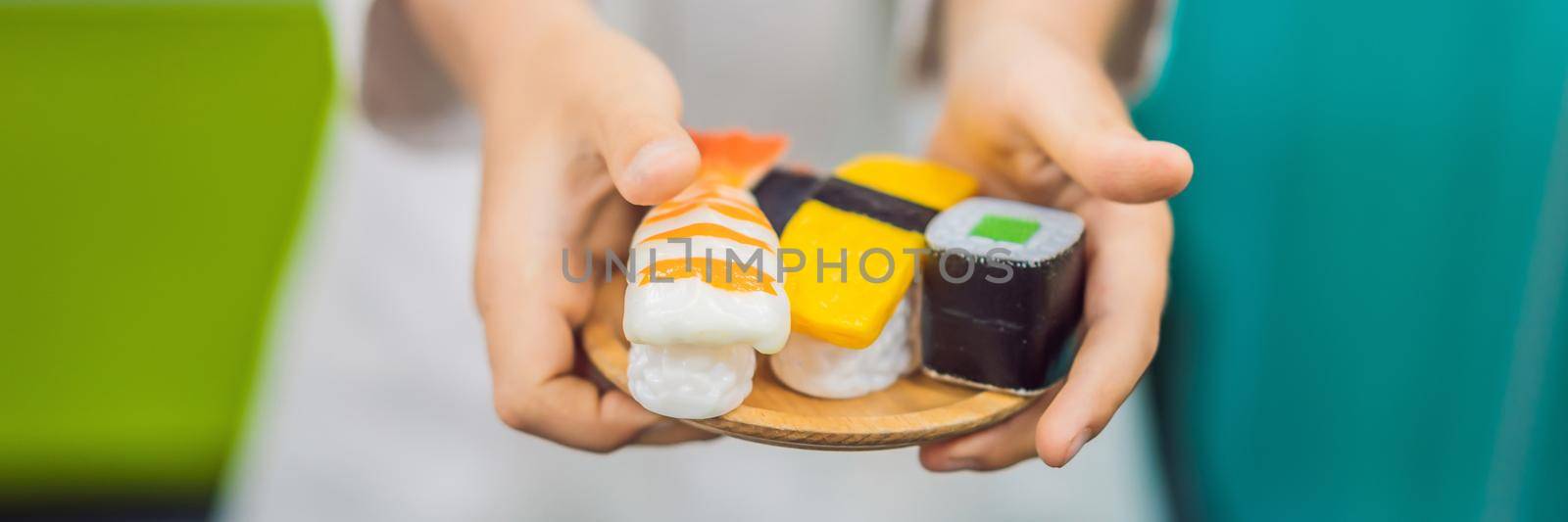 Boy plays the game as if he were a cook in a children's kitchen BANNER, LONG FORMAT by galitskaya