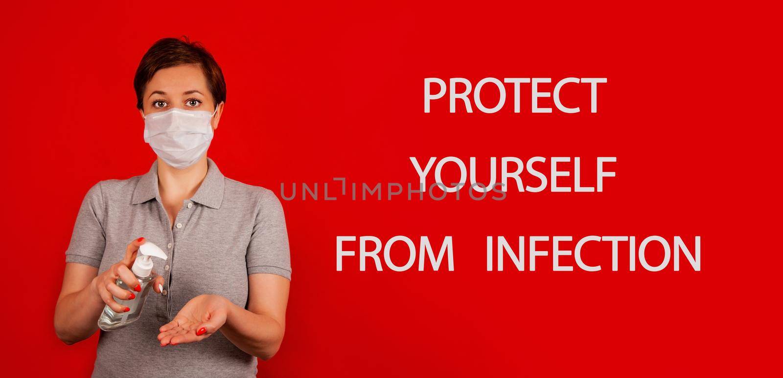 A woman uses a gel, disinfectant, antiseptic. Hand sanitizer prevents viral and plague infections, prevents the appearance of the Kovid-19 virus.
