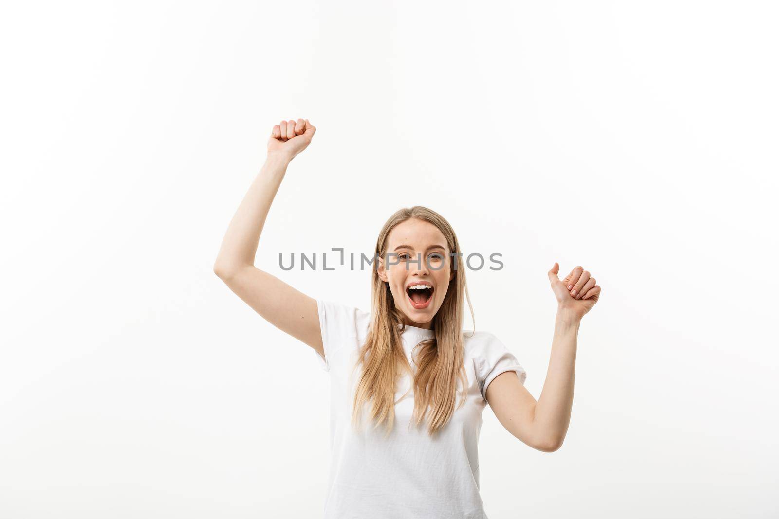 Beautiful happy woman at celebration. Birthday or New Year eve celebrating concept. Isolated over white background