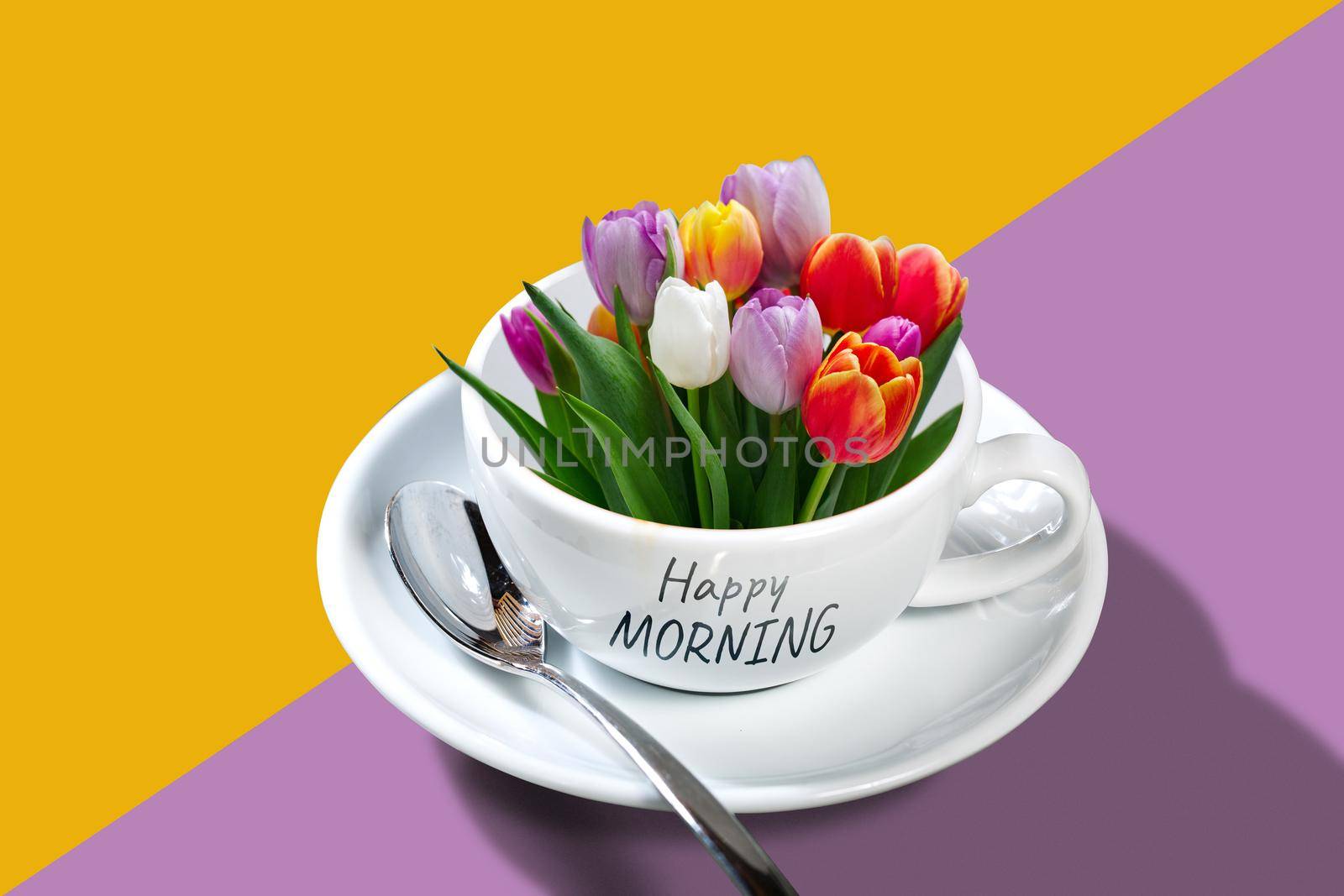 Bouquet of colorful tulips in a coffee cup with a saucer and a spoon on solid colors background. Happy morning and good mood concept illustration