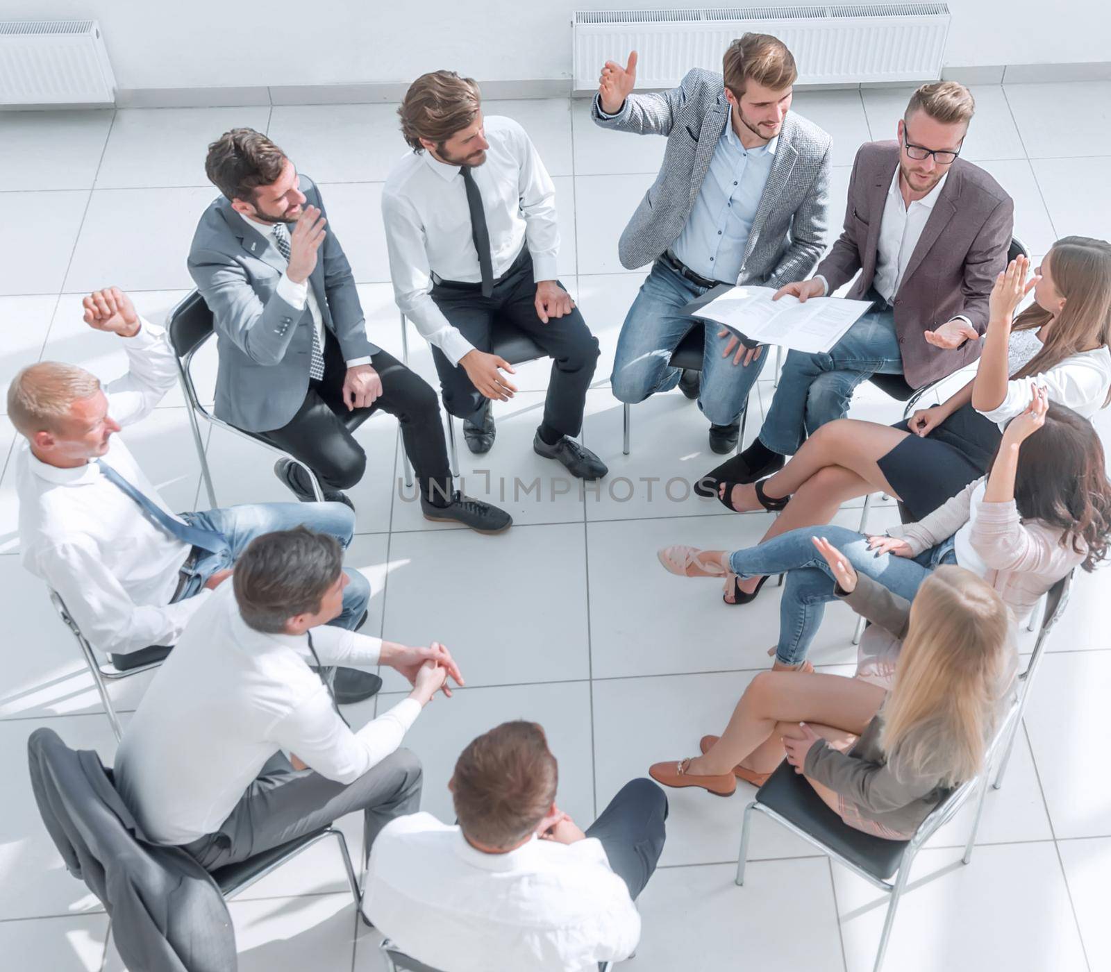 top view. young employees ask questions during business training