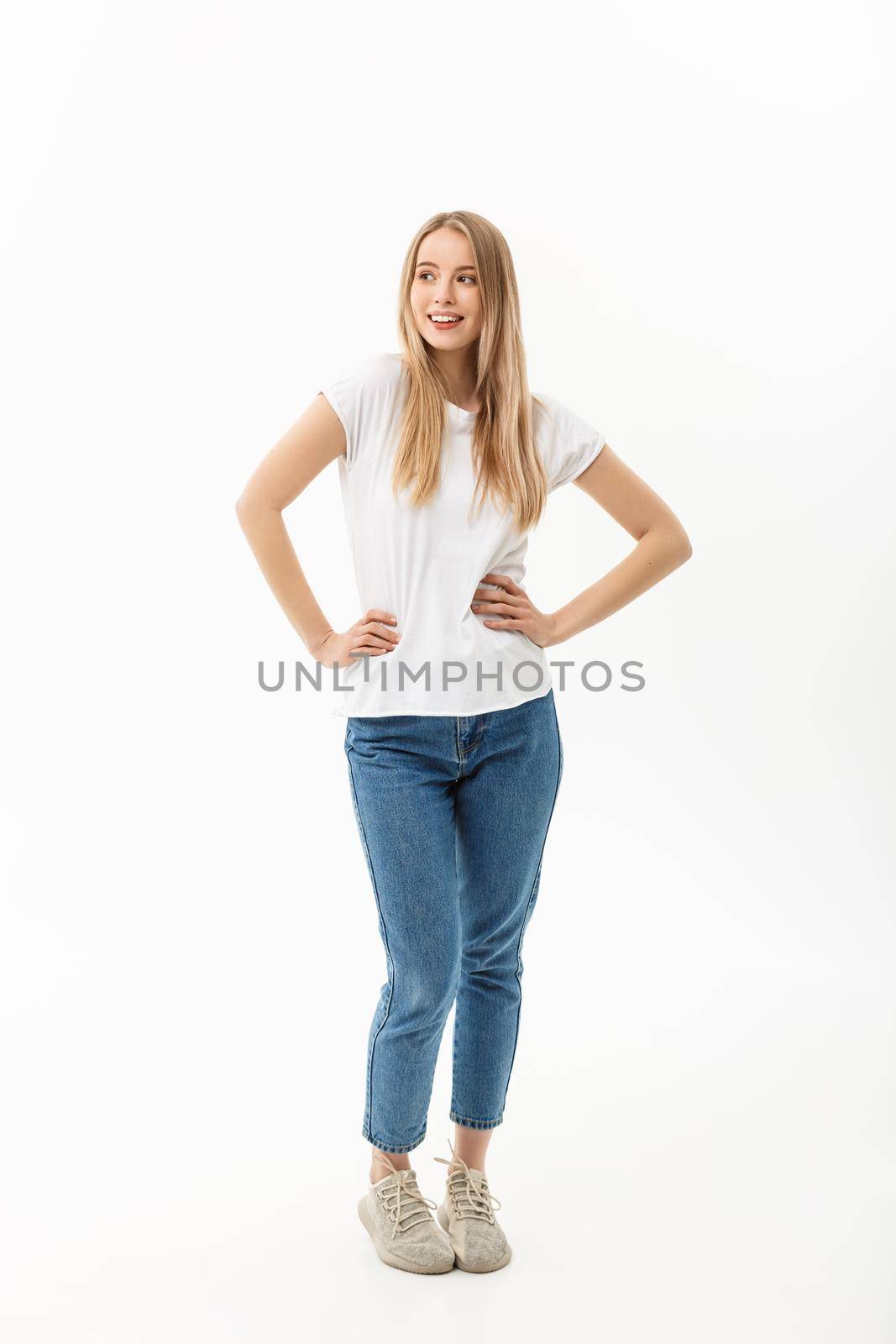 Beautiful standing woman model posing isolated on a white background by Benzoix