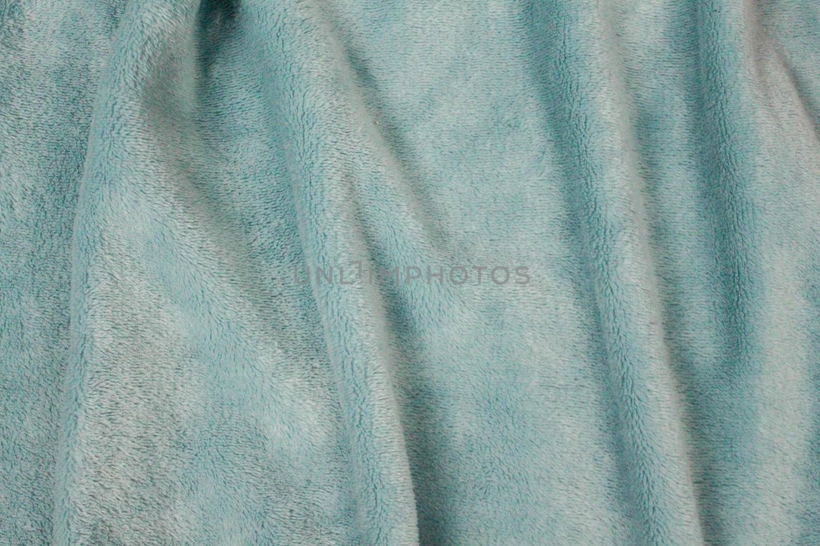 Plush cute blanket wavy texture. Light blue with shadows waves.