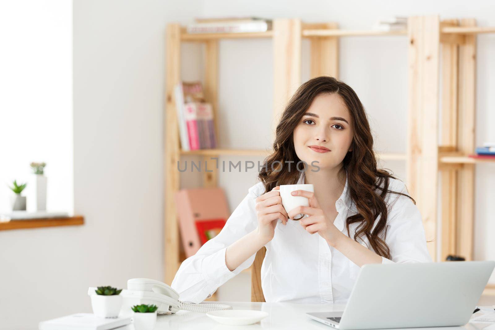 Woman Freelancer or business woman used Labtop working at modern office. Business and Technology concept.