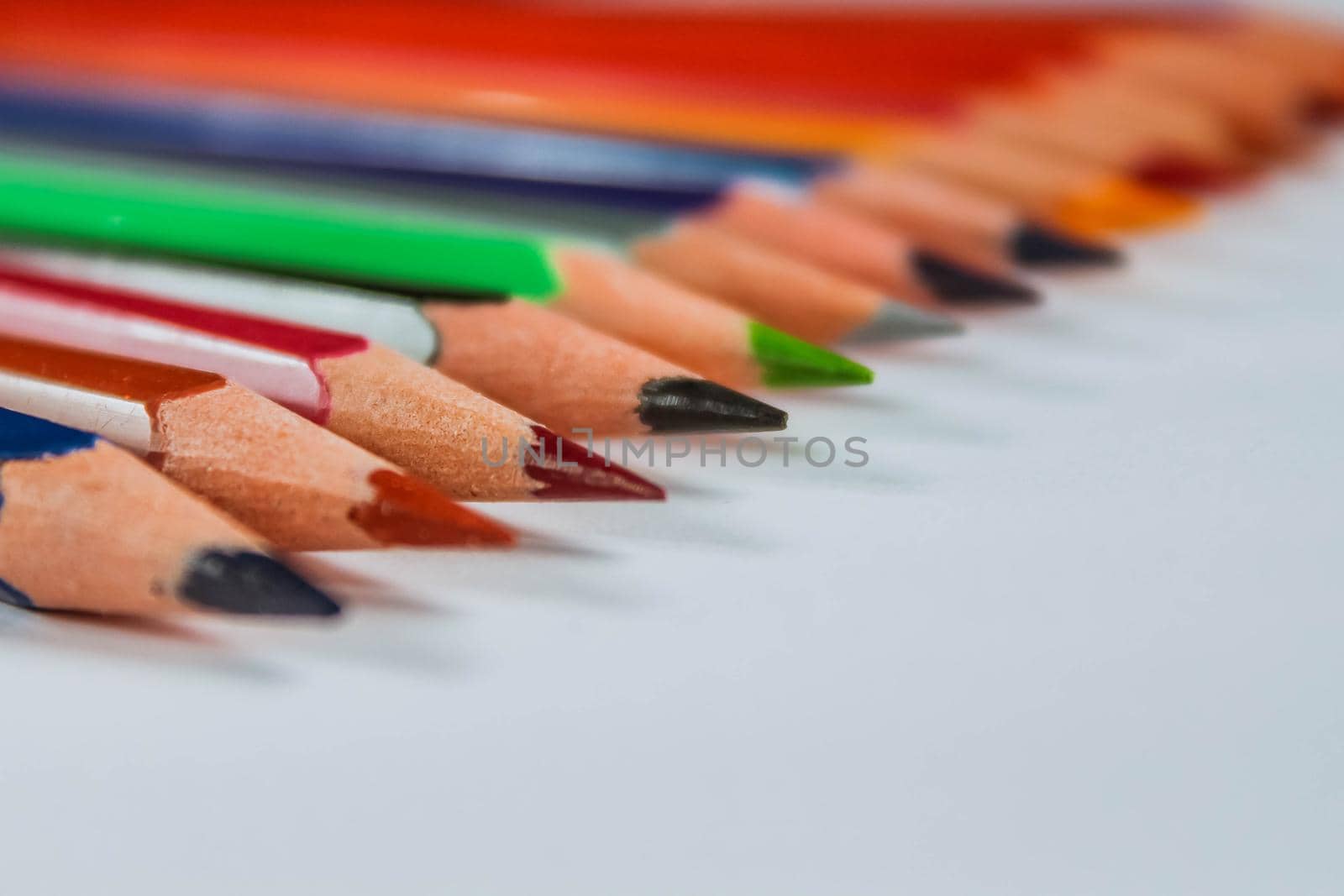 Color pencil with copy space isolated on white background,education frame concept. by JuliaDorian