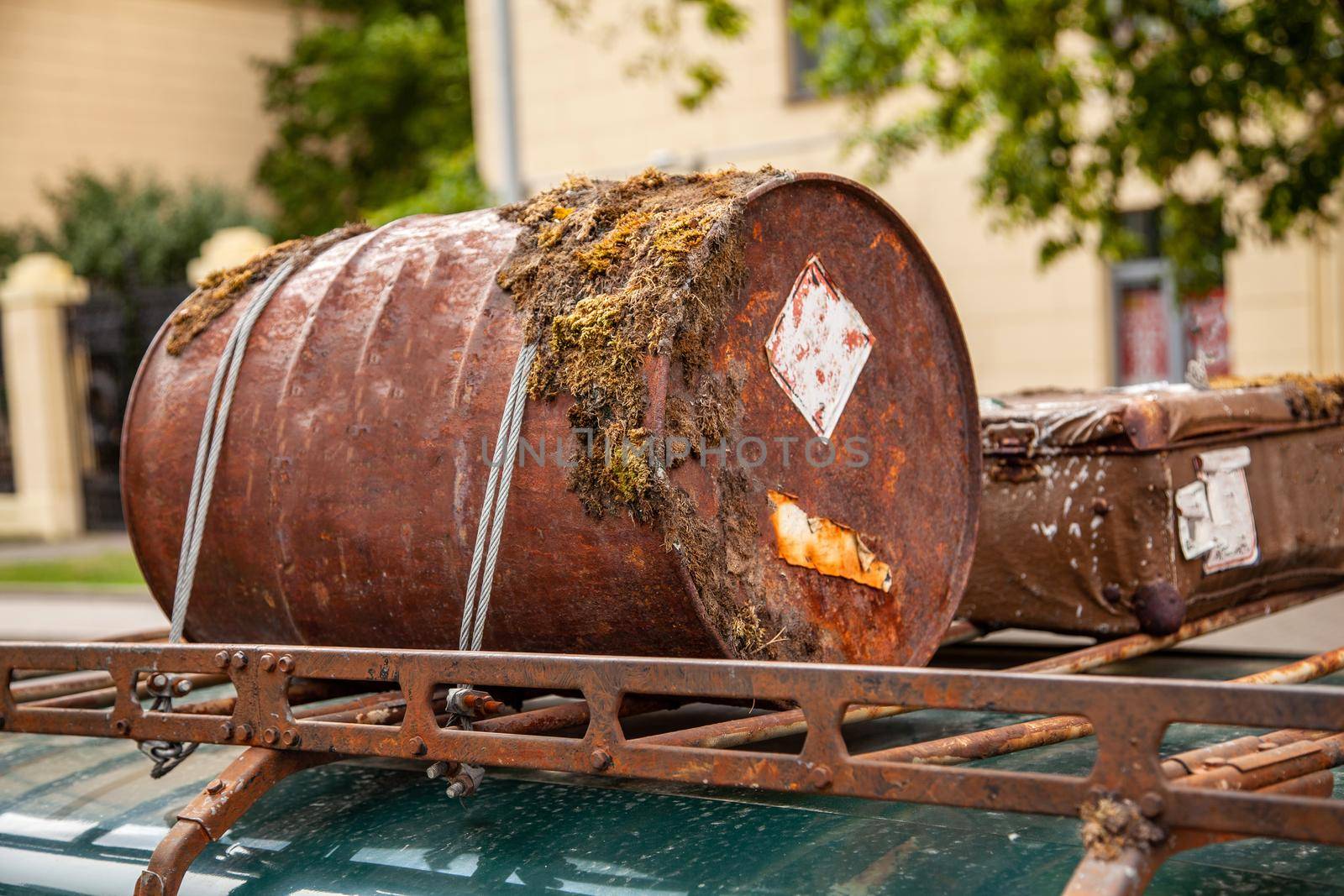 Rusted barrel in the trunk of the car.