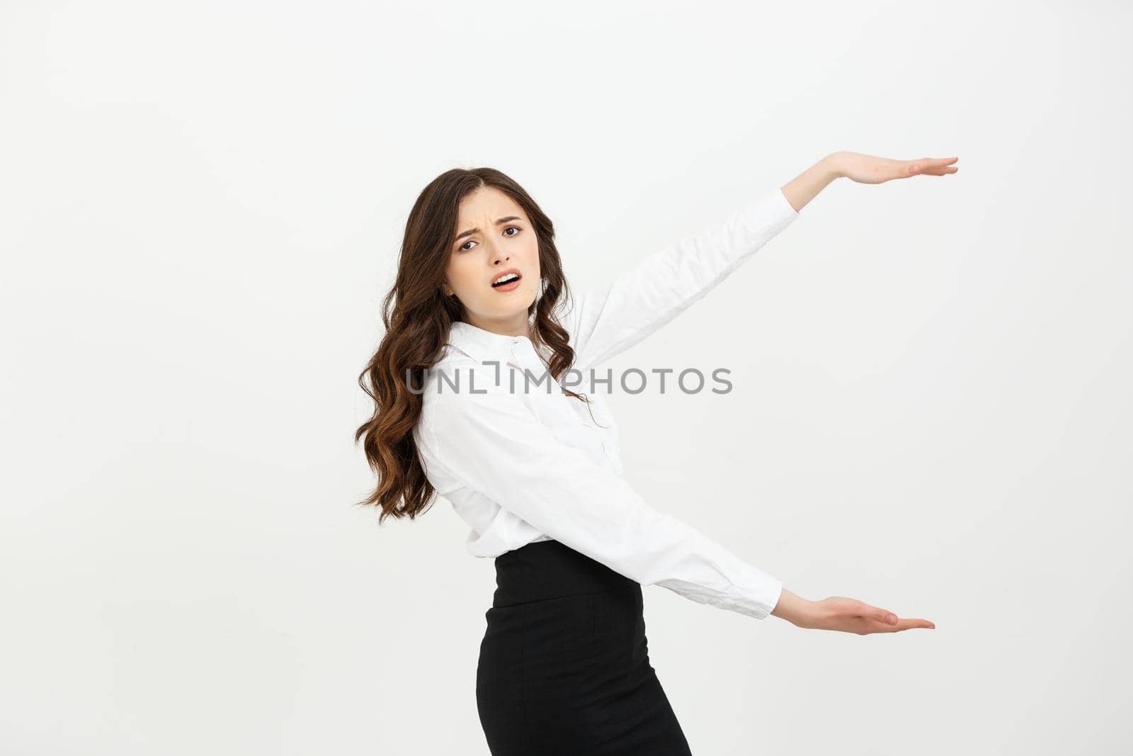 Portrait businesswoman showing and presenting copy space in business dress suit isolated on white background