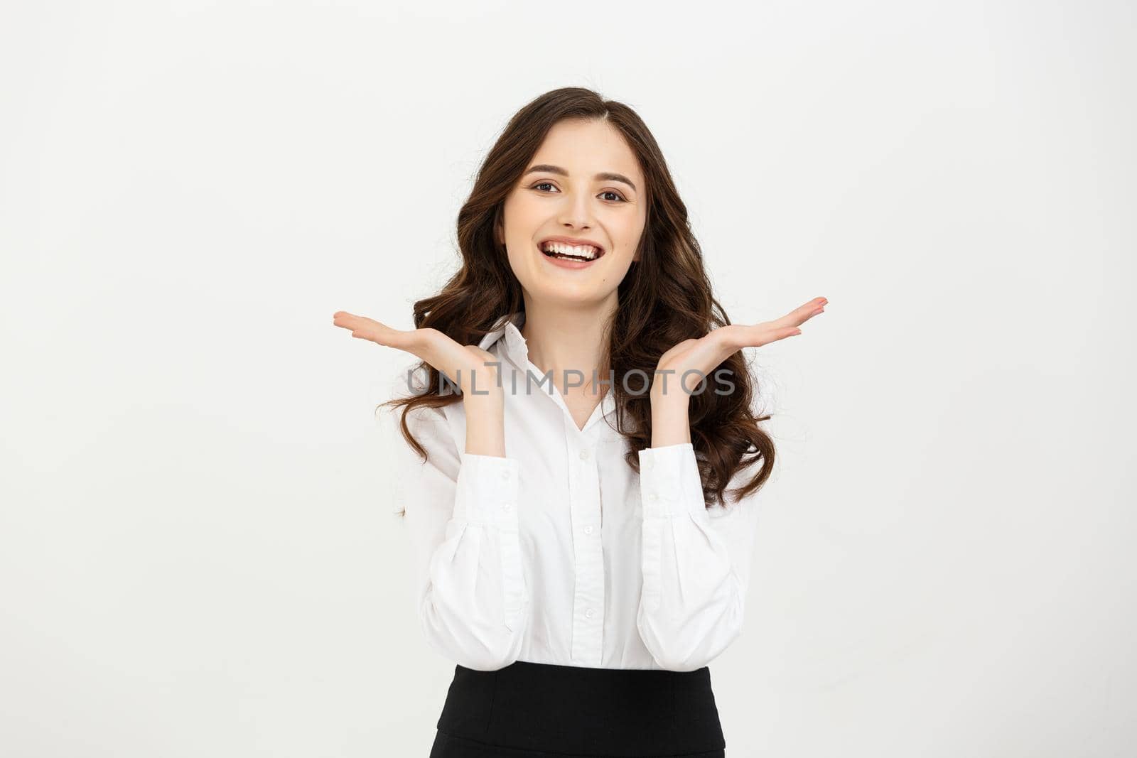 Portrait of happy young business woman isolated on white background.