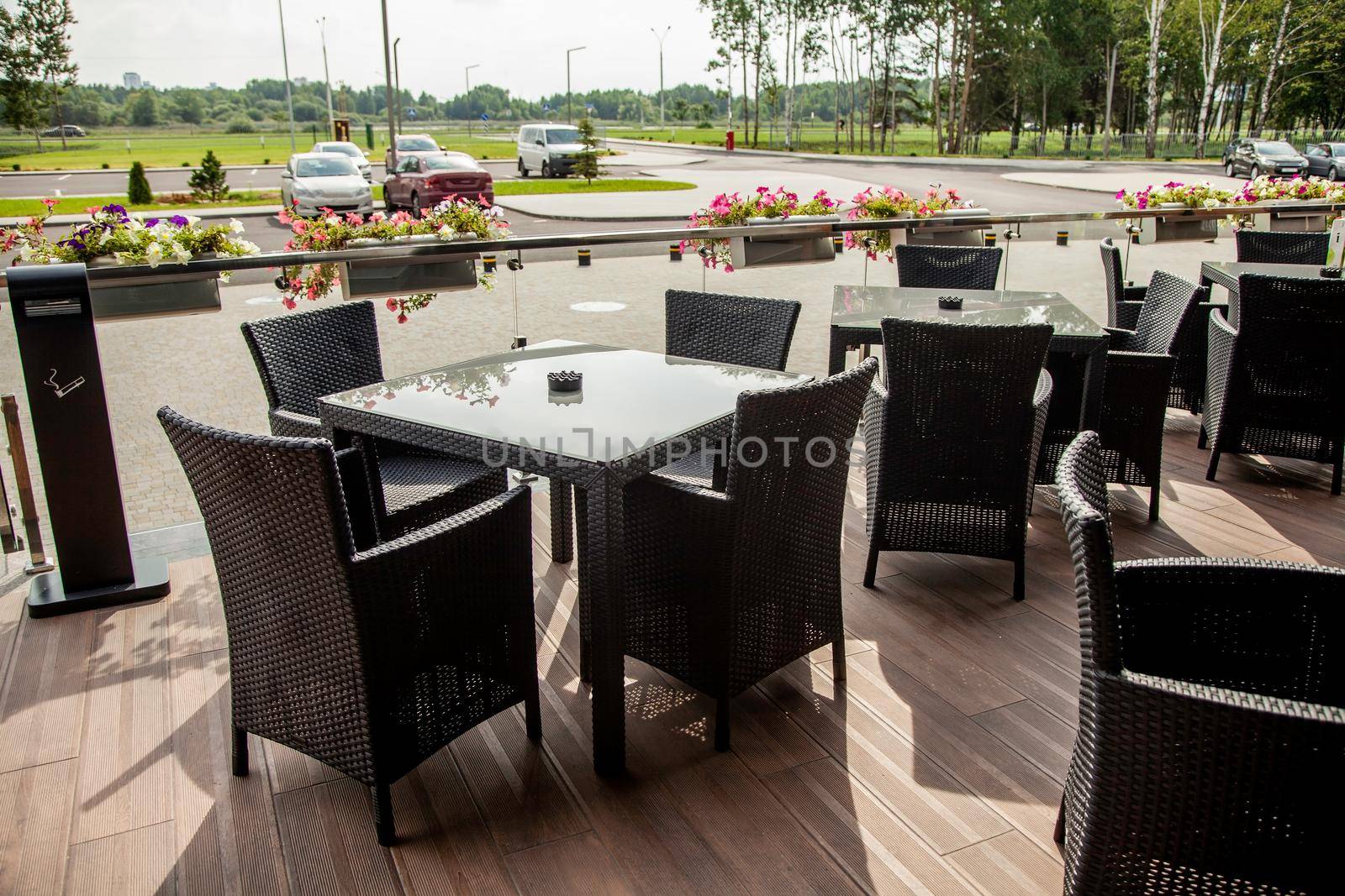 Tables on the Terrace of the restaurant on the street.