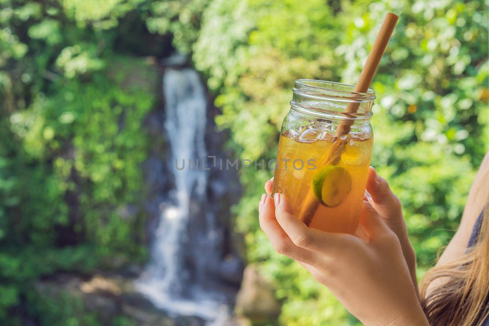Iced tea on the background of waterfalls.