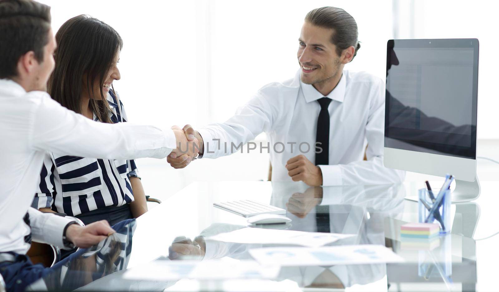 Business people shaking hands, finishing up a meeting.business concept