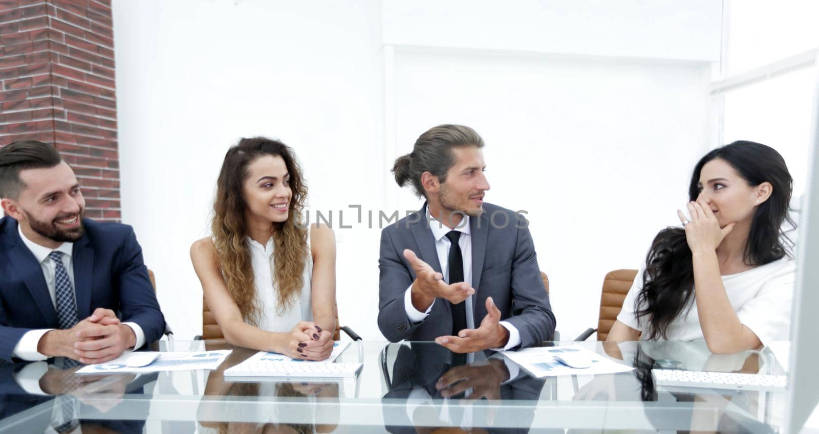 business team discussing a new presentation in a modern office