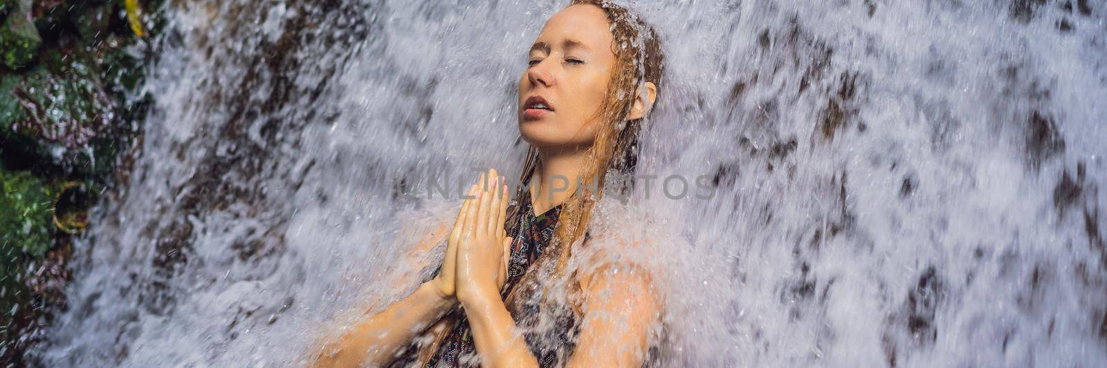 Young woman tourist in Holy springs Sebatu in Bali. BANNER, LONG FORMAT