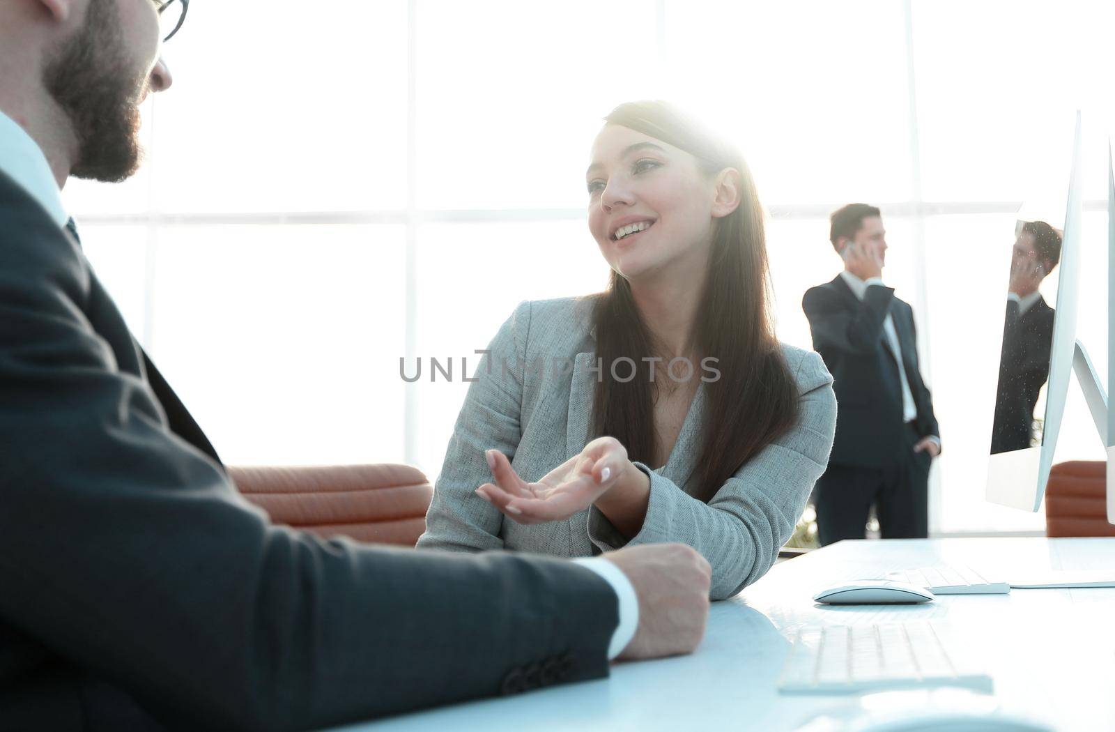 colleagues discussing information from the computer.photo with copy space