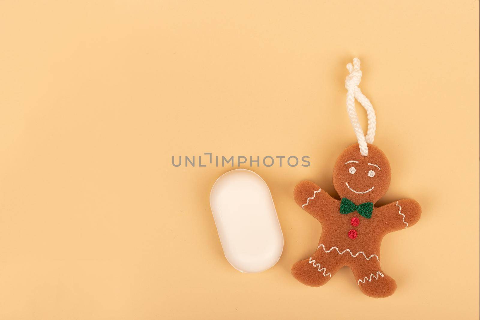 Soap and washcloth in the form of a cheerful cookie for comfortable washing of the child. by bySergPo