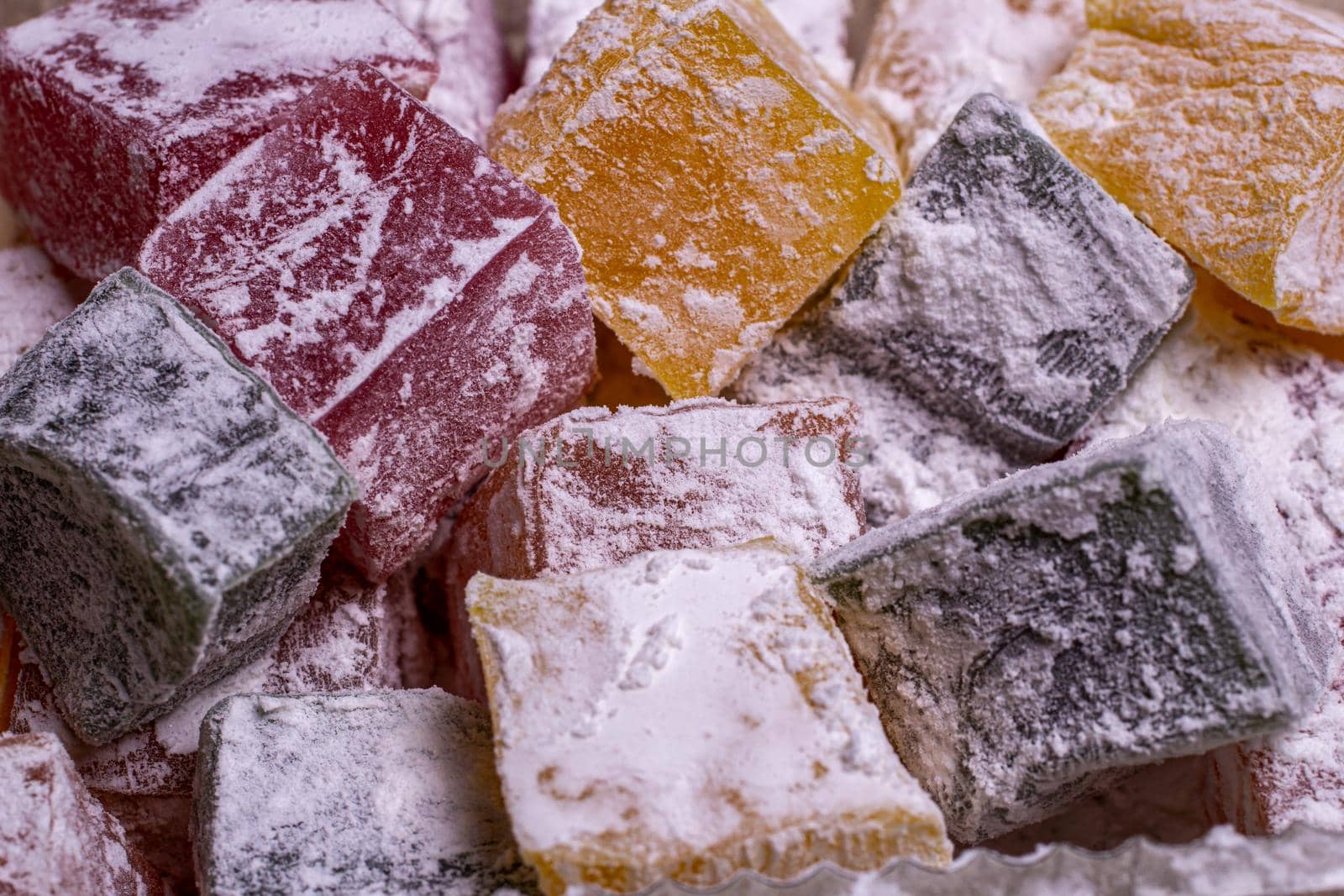 cubes of sweet turkish delight multicolored close-up