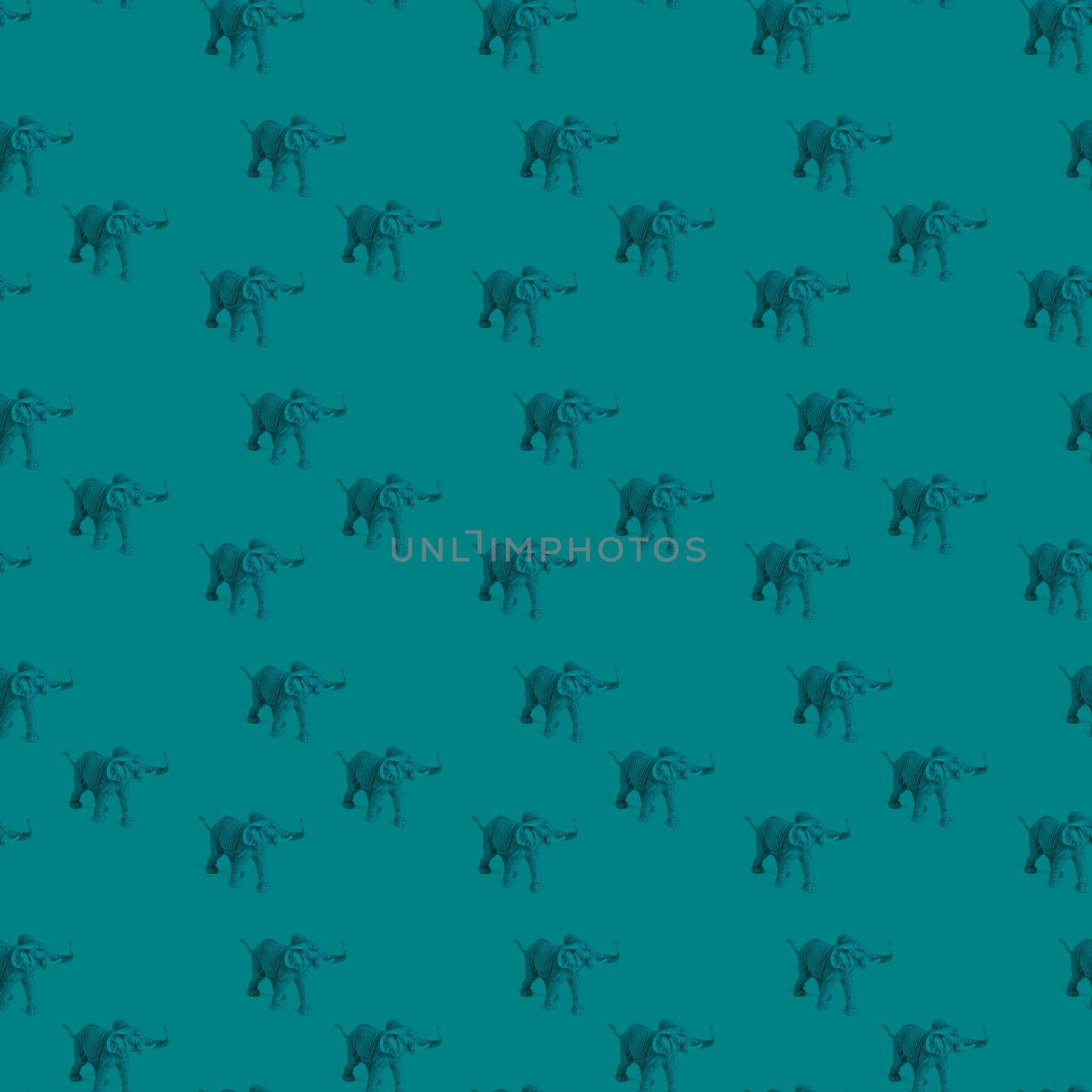 Seamless pattern with beautiful abstract elephants in a single color