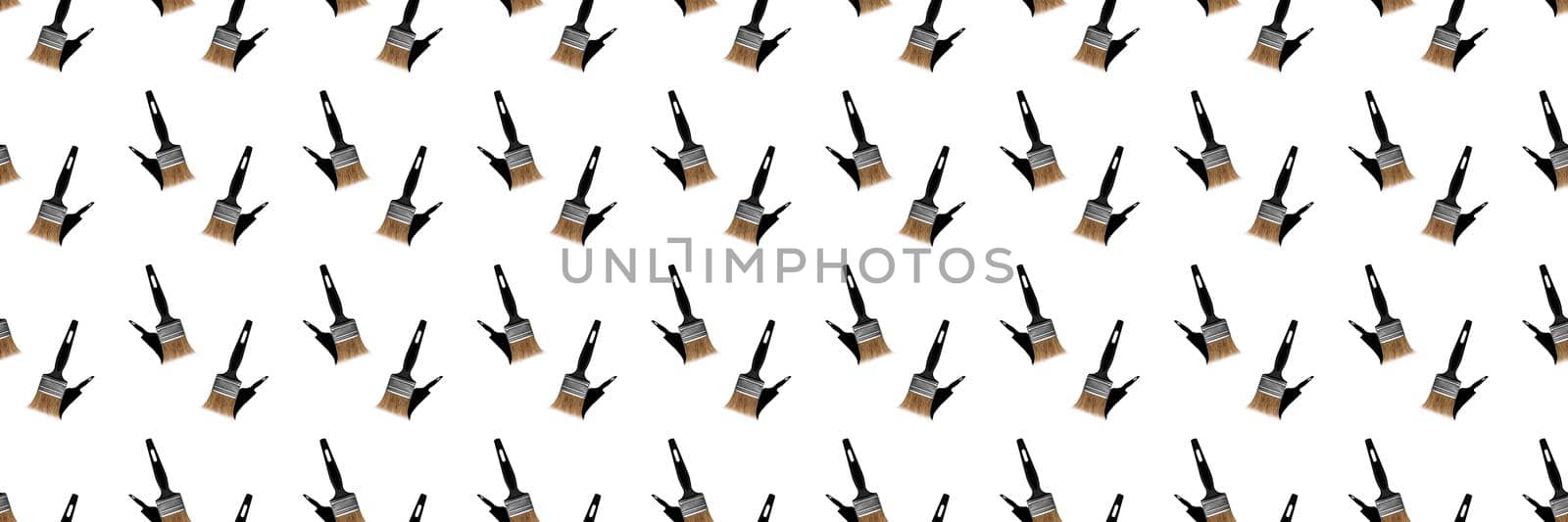Construction brushes with shadow on a white background. Seamless texture of construction brushes.