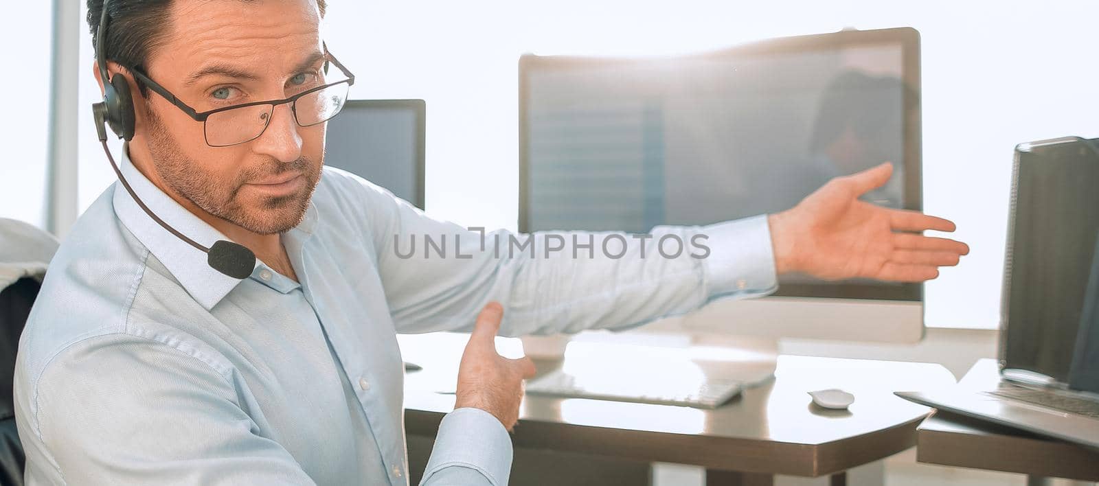 businessman sitting at his Desk in the business center.the concept of e-business