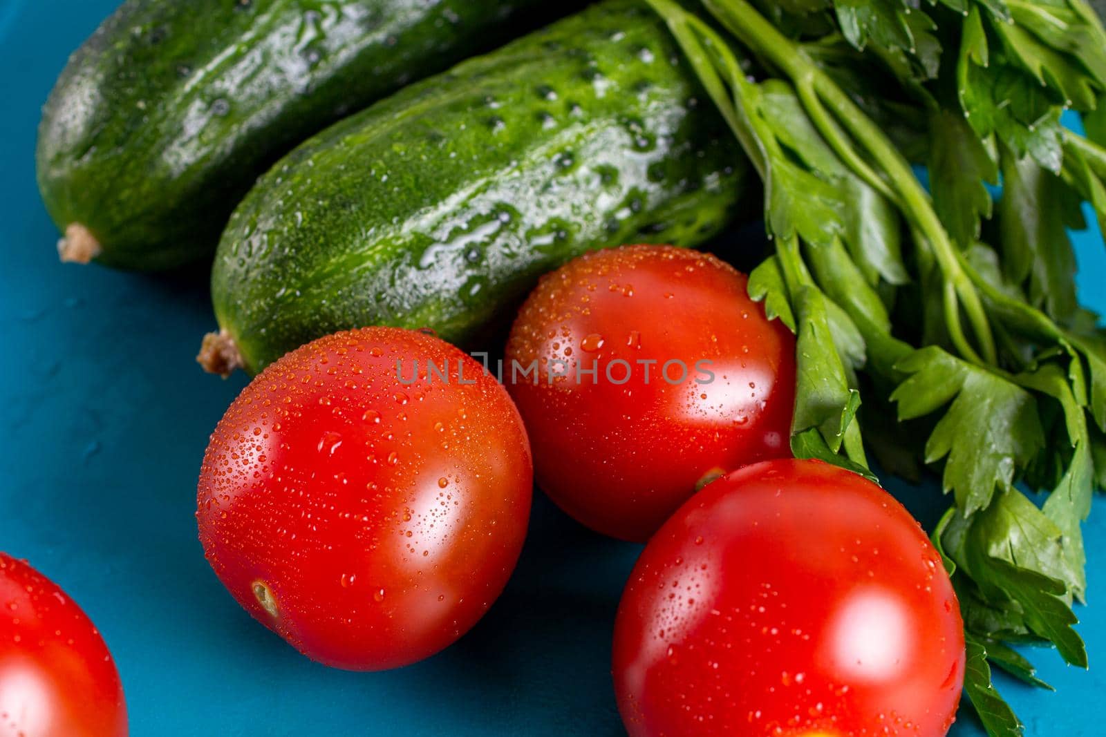 Organic vegetable healthy food tomato and cucumber close-up by bySergPo