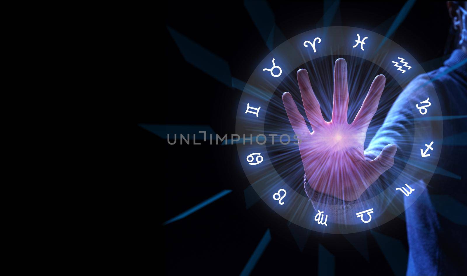 Zodiac signs inside of horoscope circle. Astrology with hand to stop.