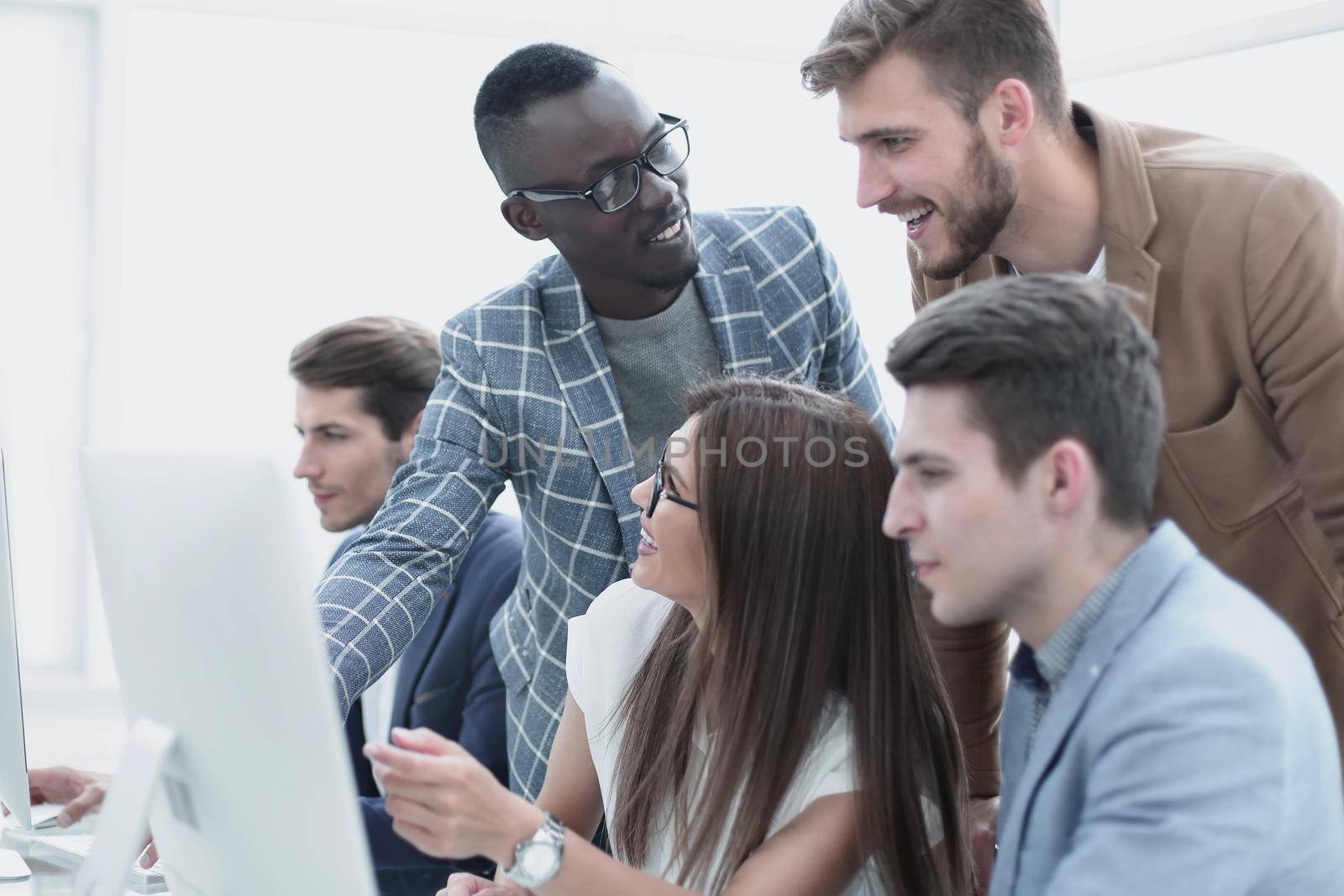 Company employees working in software development and designer office.Full concentration at work