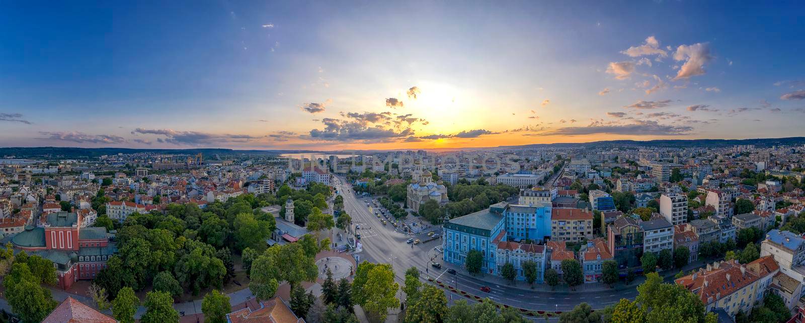 Varna, Bulgaria - July 12, 2019; Aerial view from the drone of the magnificent sunset over centrum of Varna city, Bulgaria
