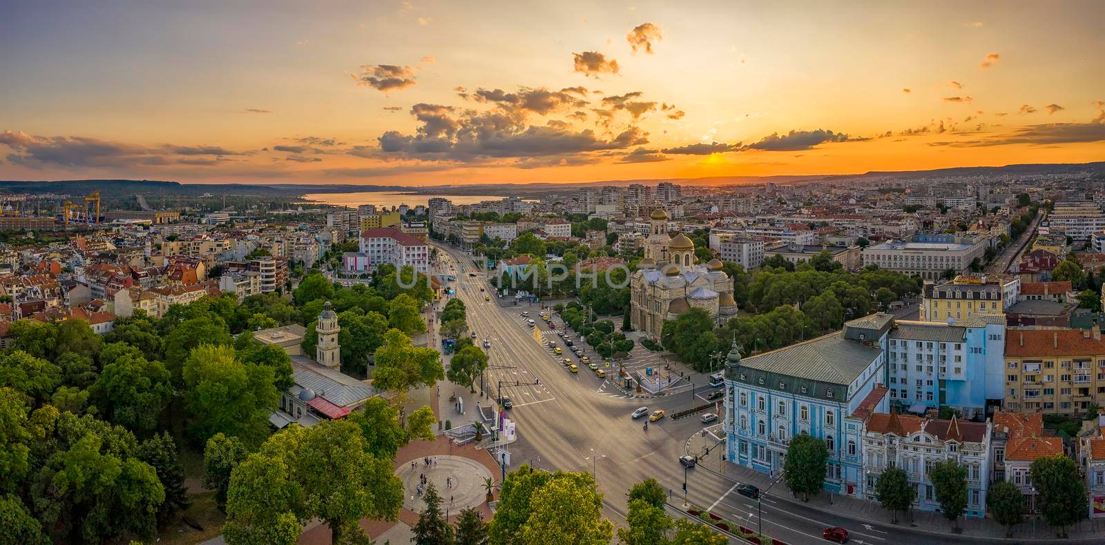 Varna, Bulgaria - July 12, 2019; Aerial view from the drone of the magnificent sunset over centrum of Varna city, Bulgaria by EdVal