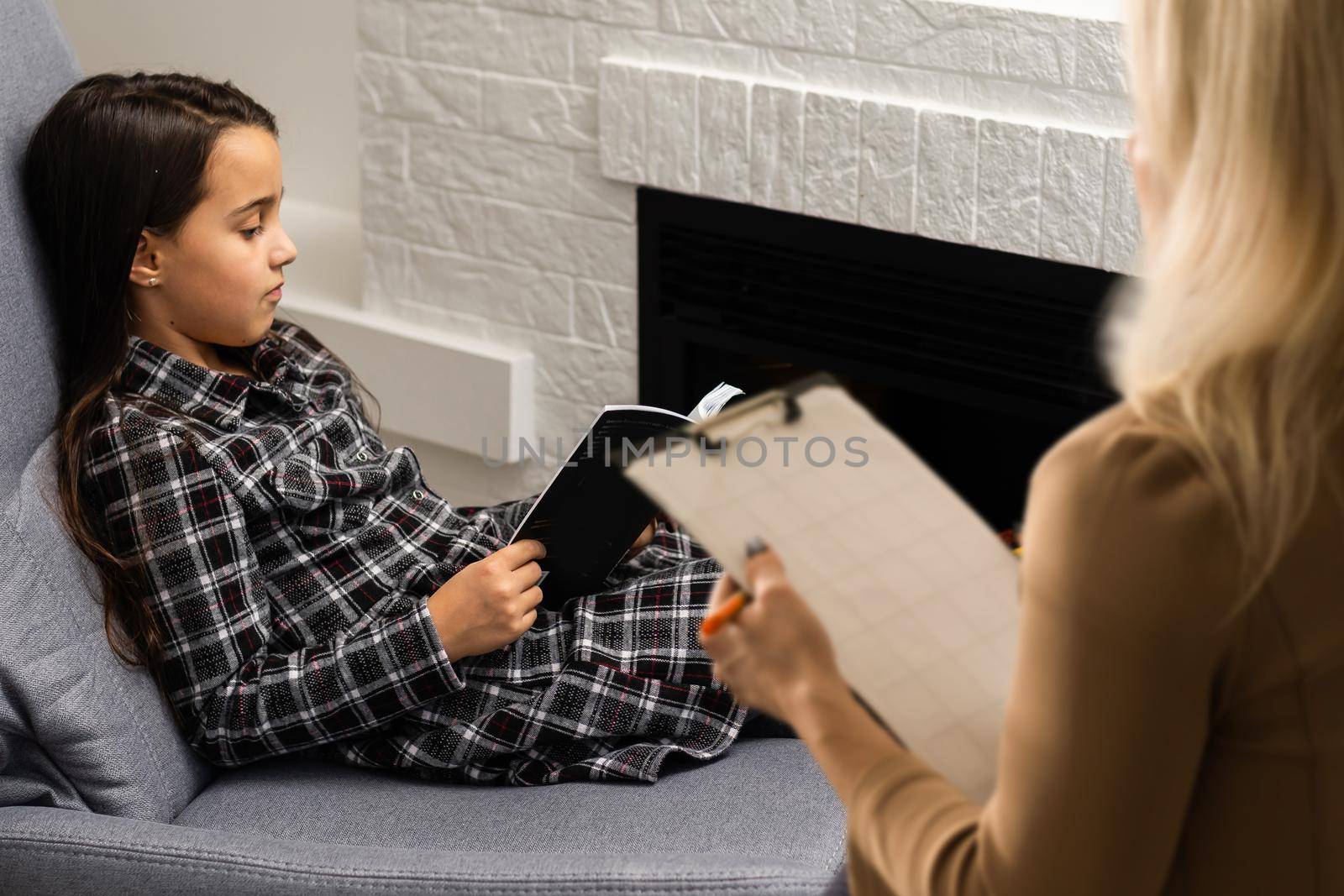 Cute little girl at child psychologist's office