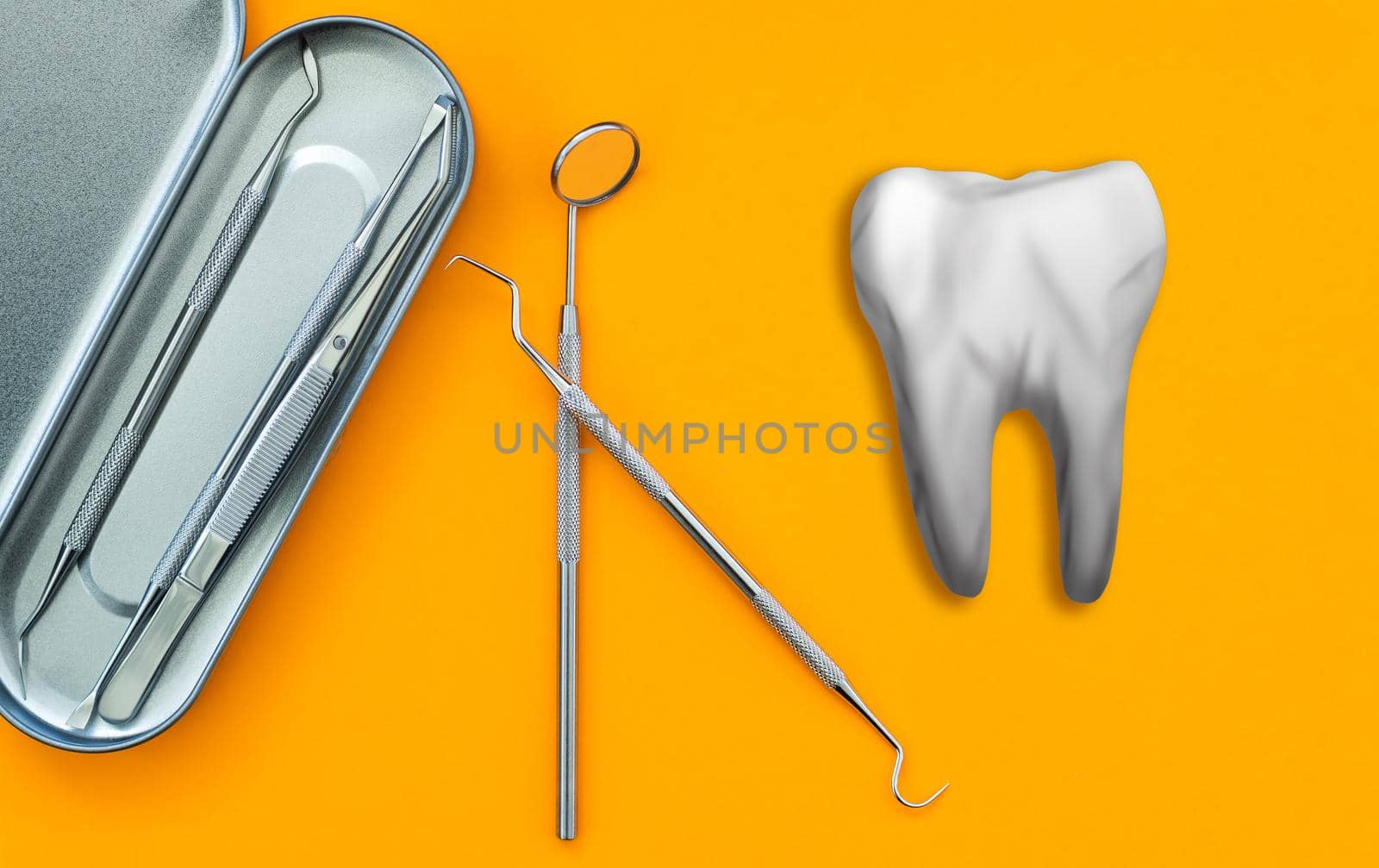 dental instrument and artificial tooth.