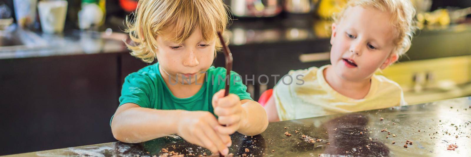 Two children a boy and a girl make cookies from dough BANNER, LONG FORMAT by galitskaya